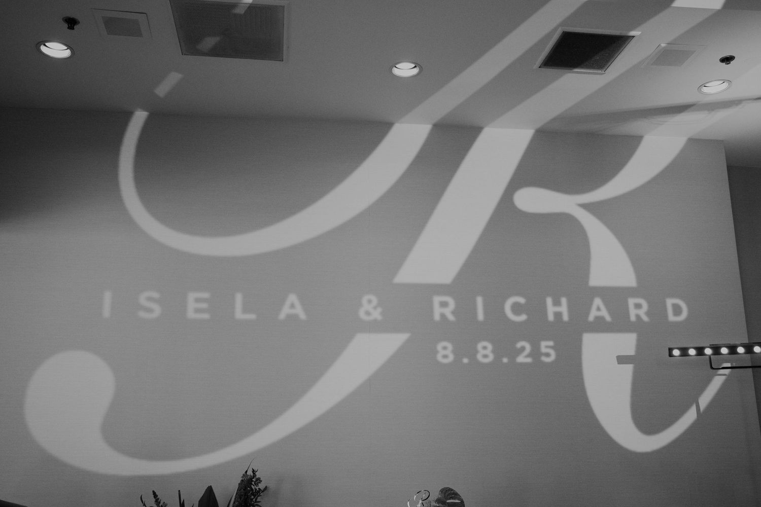 Modern wedding venue signage displaying elegant typography and branding.