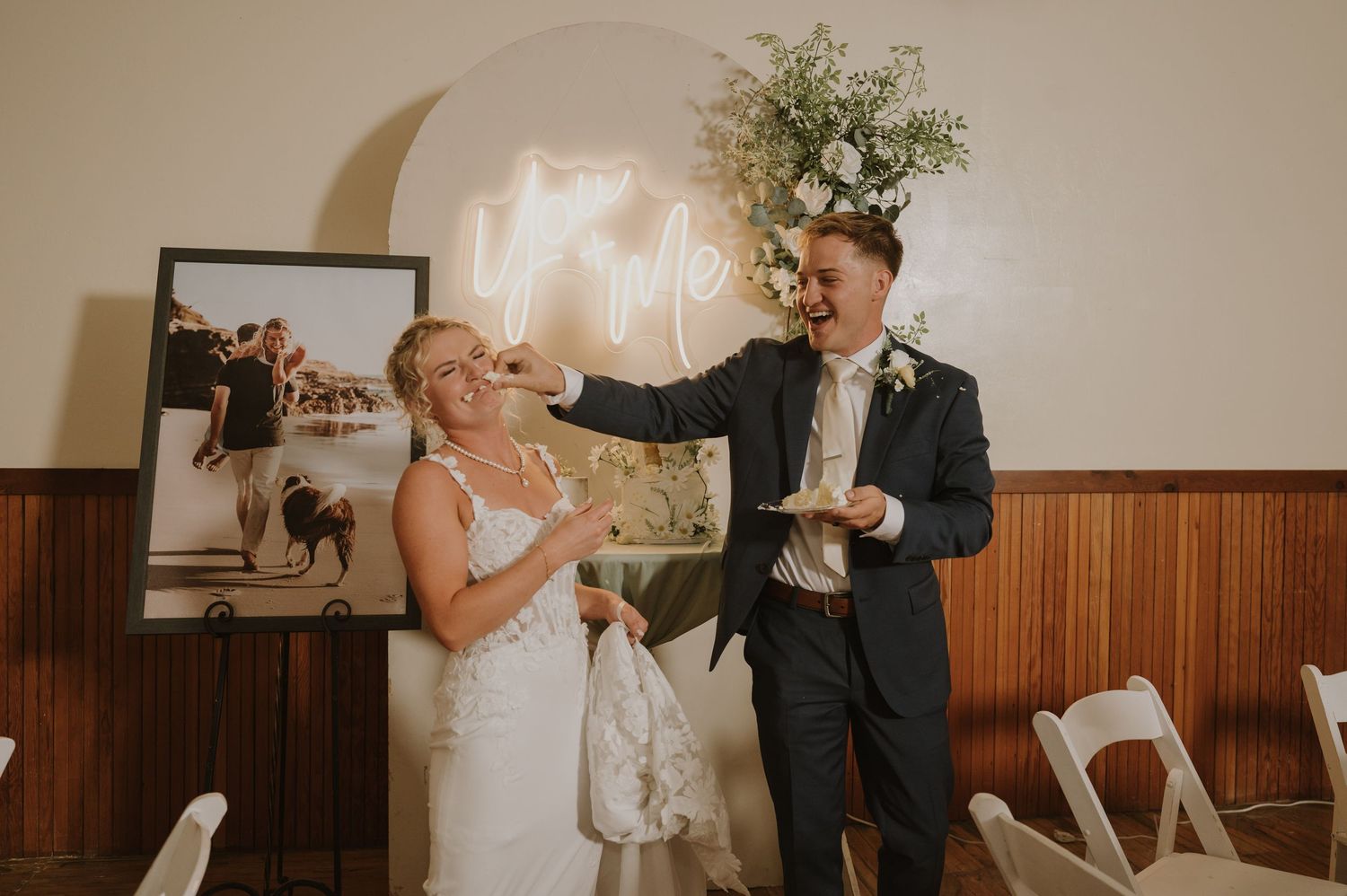 Wedding couple dancing and celebrating at their reception venue.