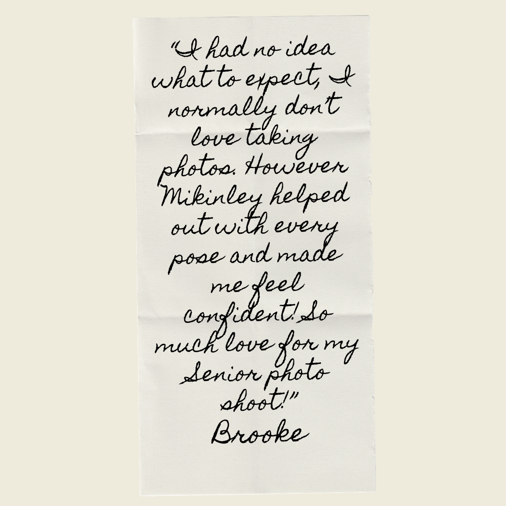 Handwritten testimonial from Brooke praising senior photo shoot experience with Mikinley, written in cursive on white paper.