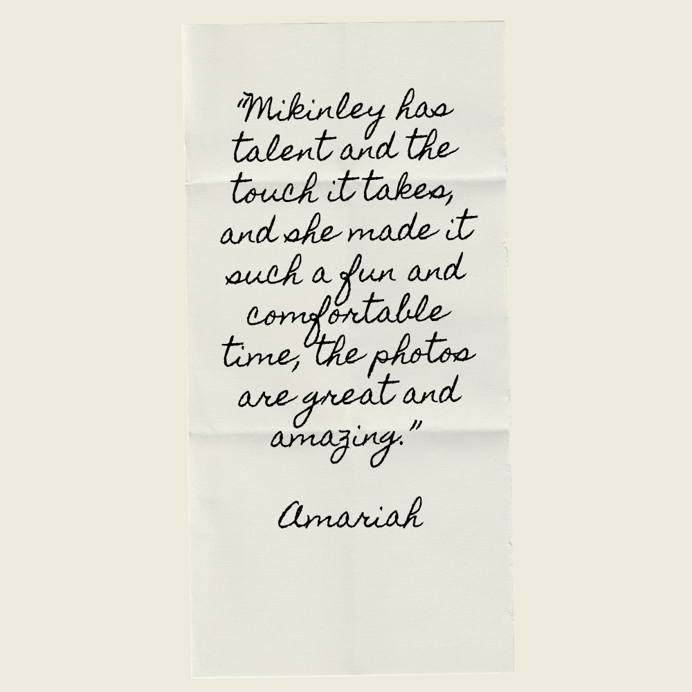 Handwritten quote on white paper praising photographer Mikinley, signed by Amariah, noting talent and amazing photos.