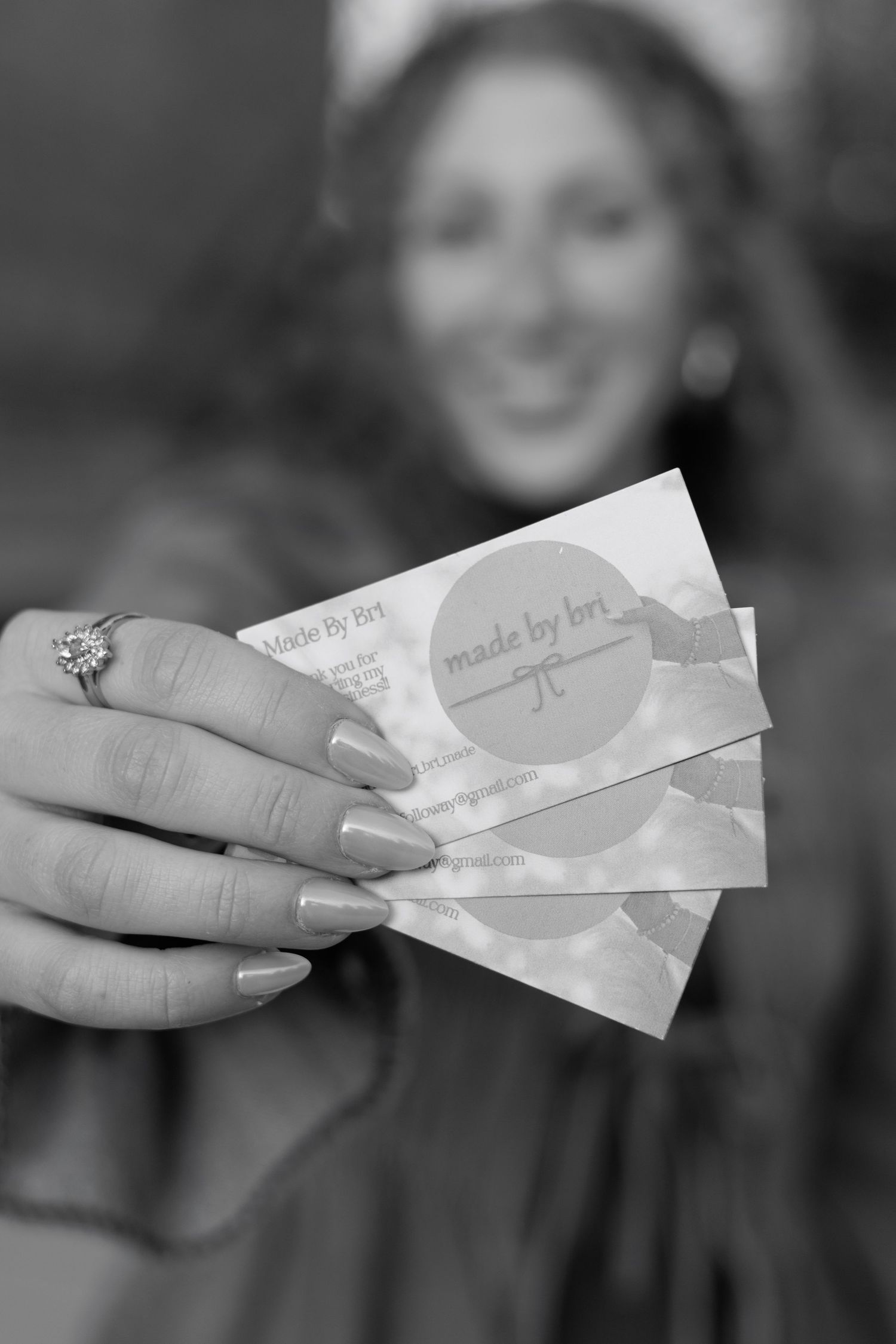 Black and white close-up of business cards.