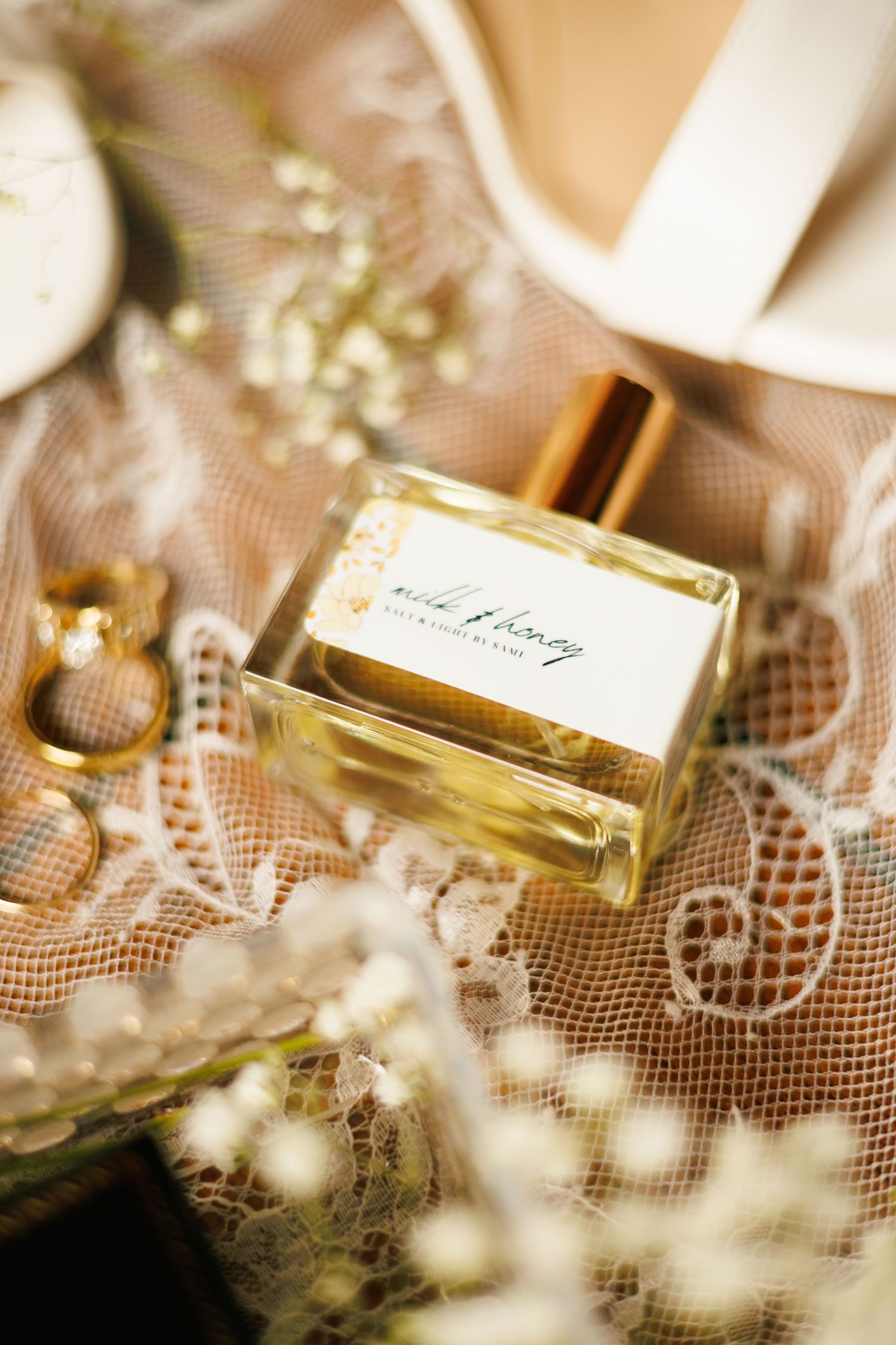 Wedding perfume bottles and lace details create an elegant vintage atmosphere.