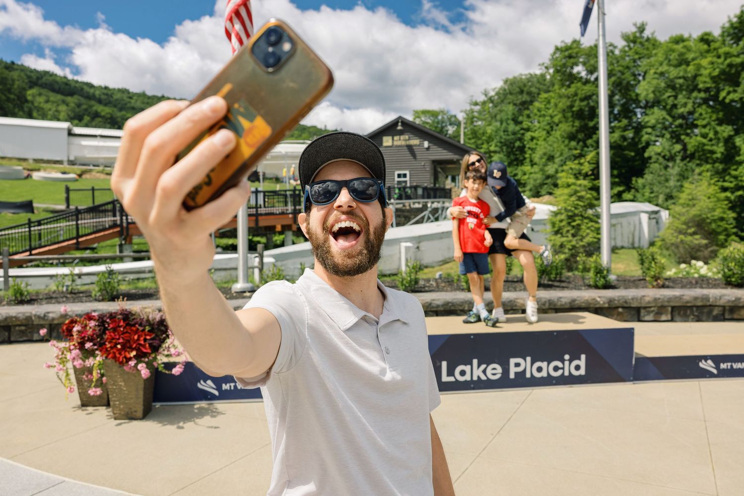 A collage of outdoor summer activities at Lake Placid showing people enjoying boating, hiking, and recreational pursuits.
