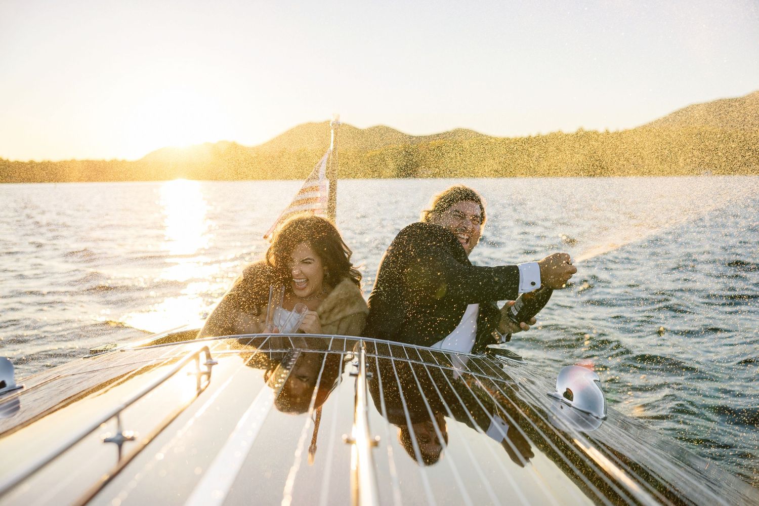 Romantic sunset photos on a wooden dock by the water with golden light.