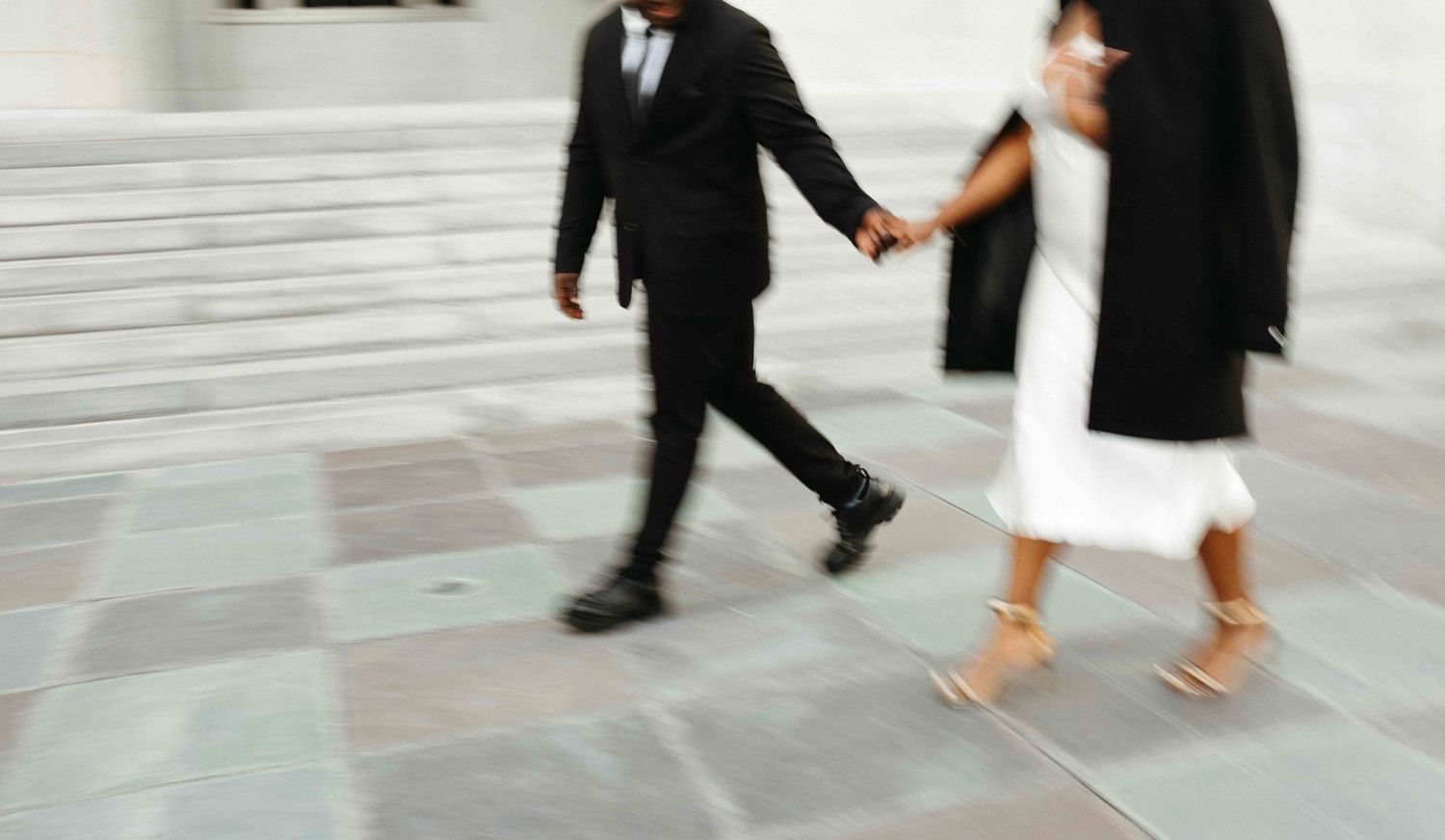 Blurry Photo of couples holding hands