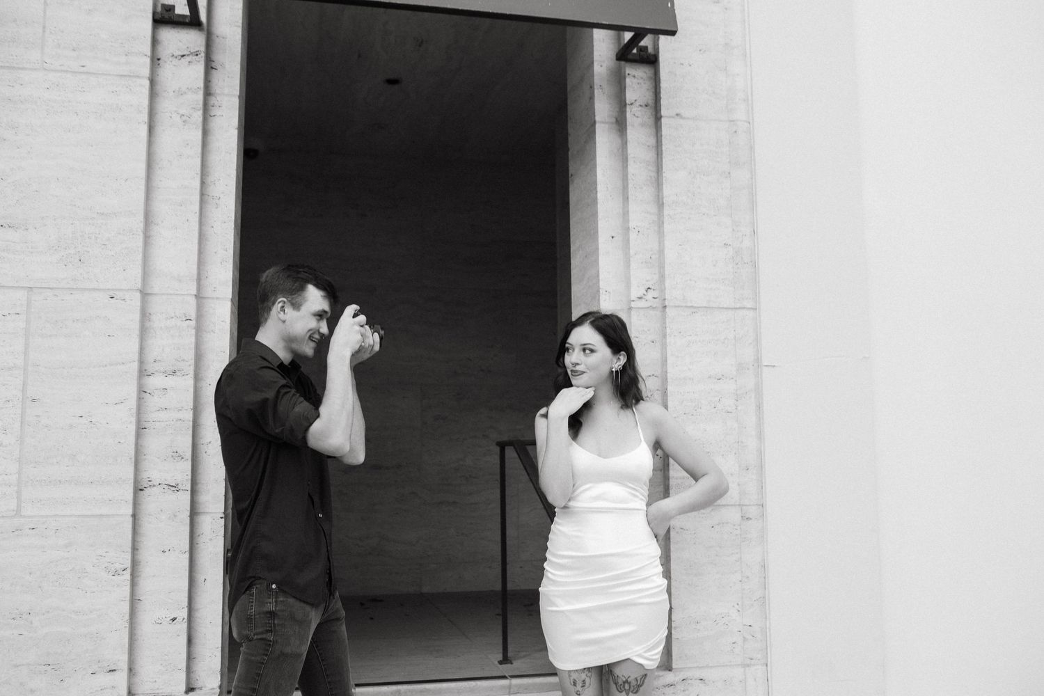 Cute photo of couple taking photos of each other