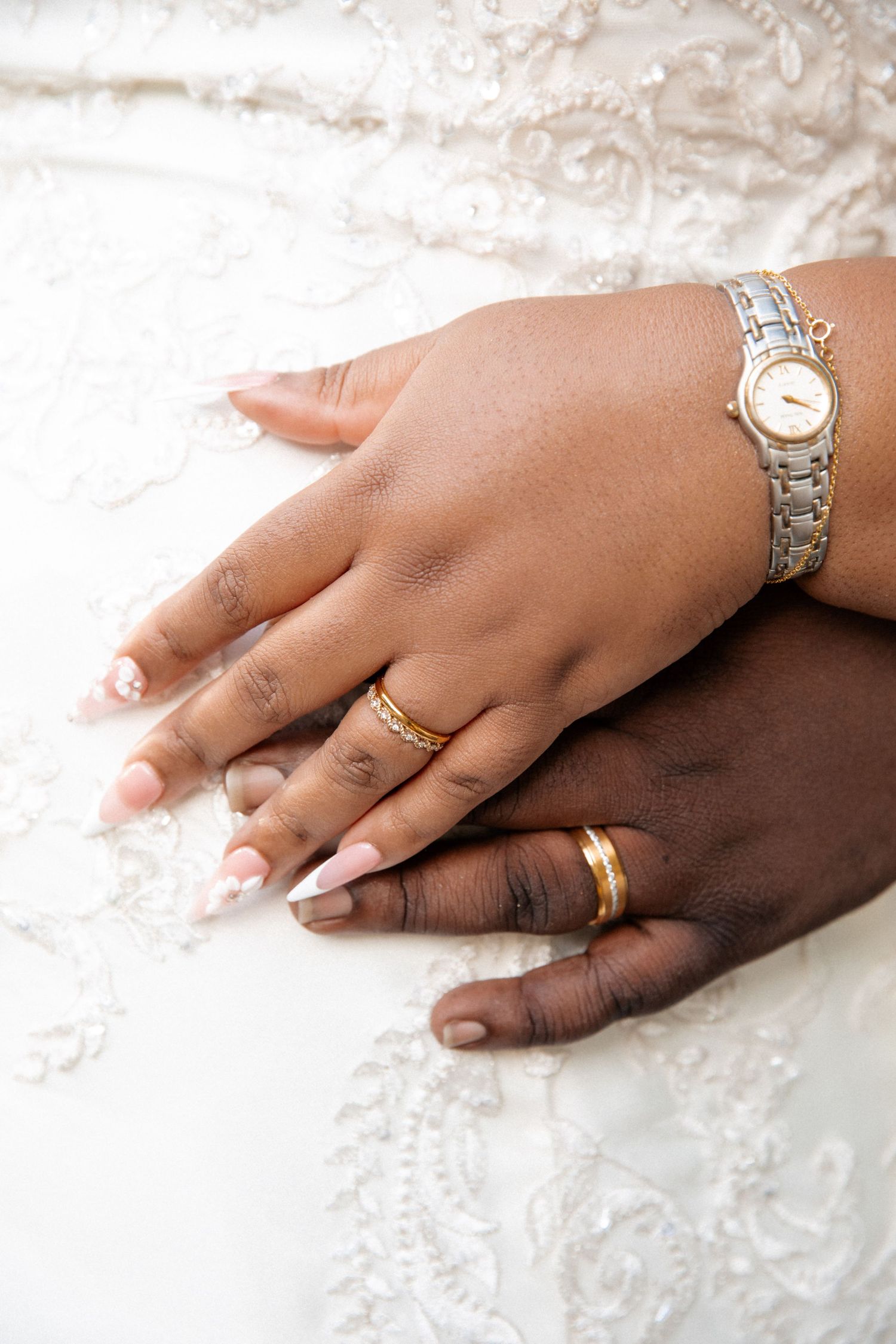 Couples hand with wedding rings