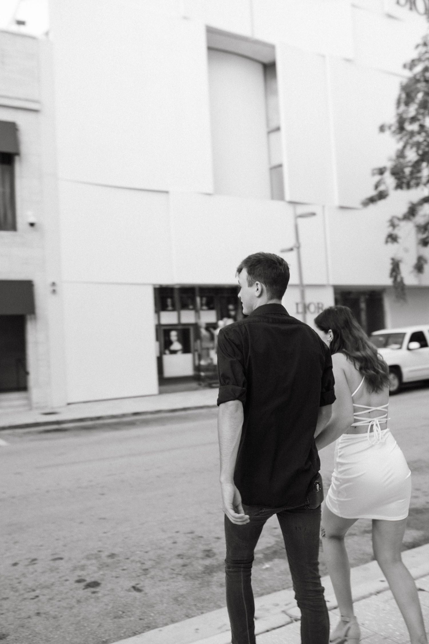 Image of couple crossing the streets