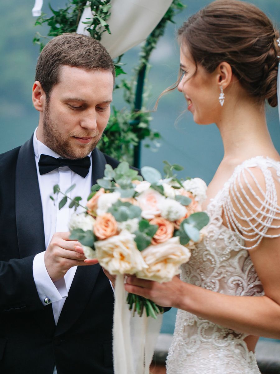 A romantic wedding moment captured in a series of photos showing the couple sharing intimate glances with peach florals.