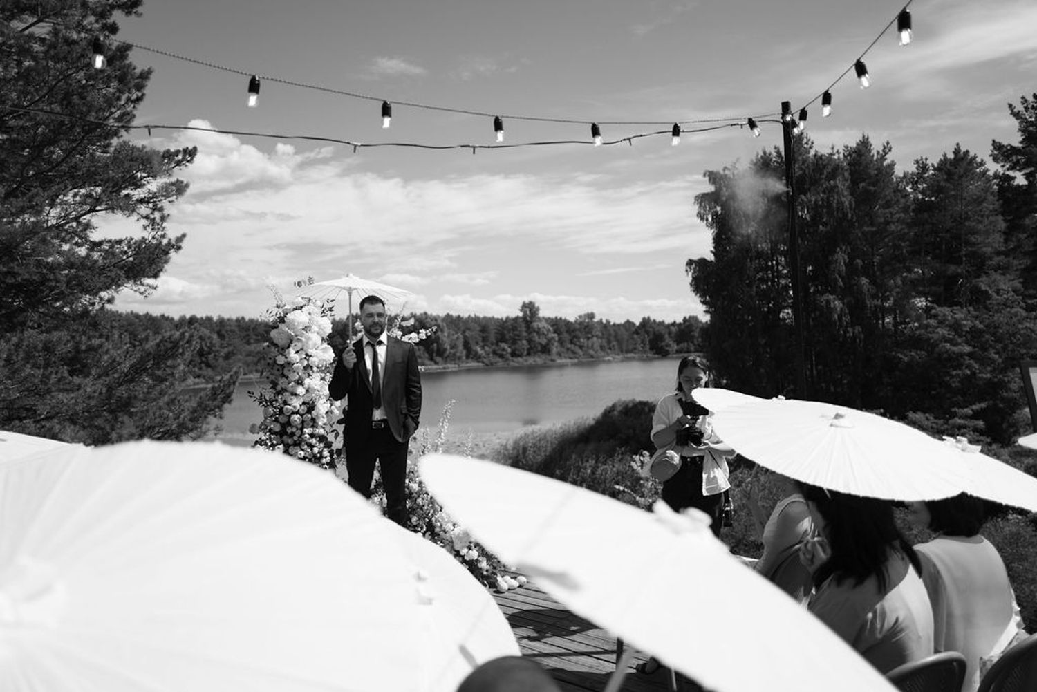 A series of winter wedding photos showing snowy landscapes, string lights, and romantic moments in a snowy setting.
