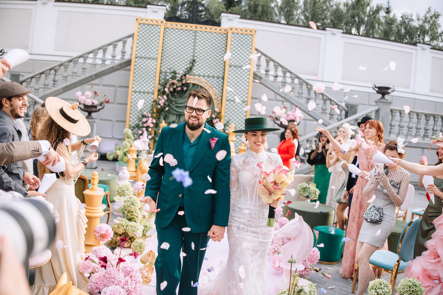 A collection of wedding celebration photos showing guests enjoying festivities at an elegant outdoor venue.