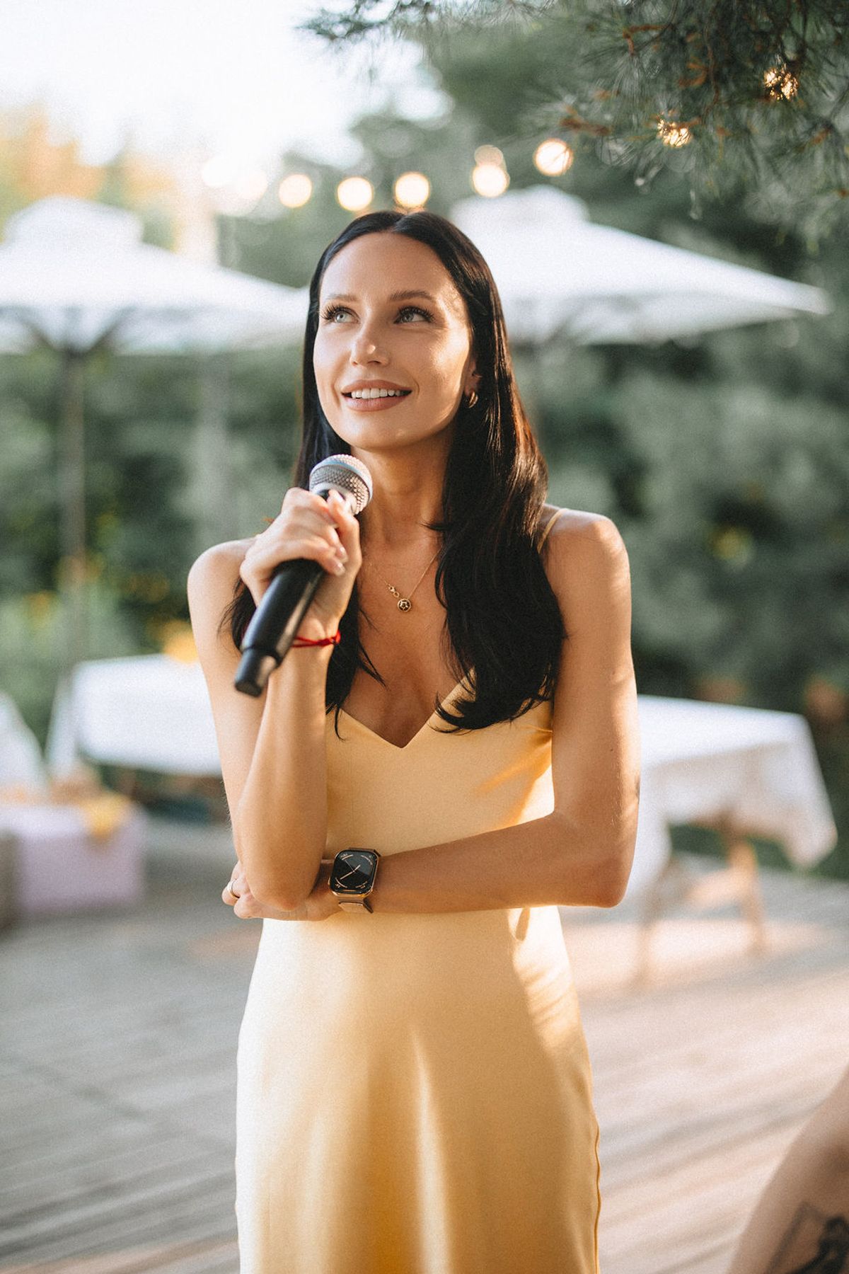 A series of candid photos showing someone in a yellow dress posing outdoors with natural lighting and bokeh effects.
