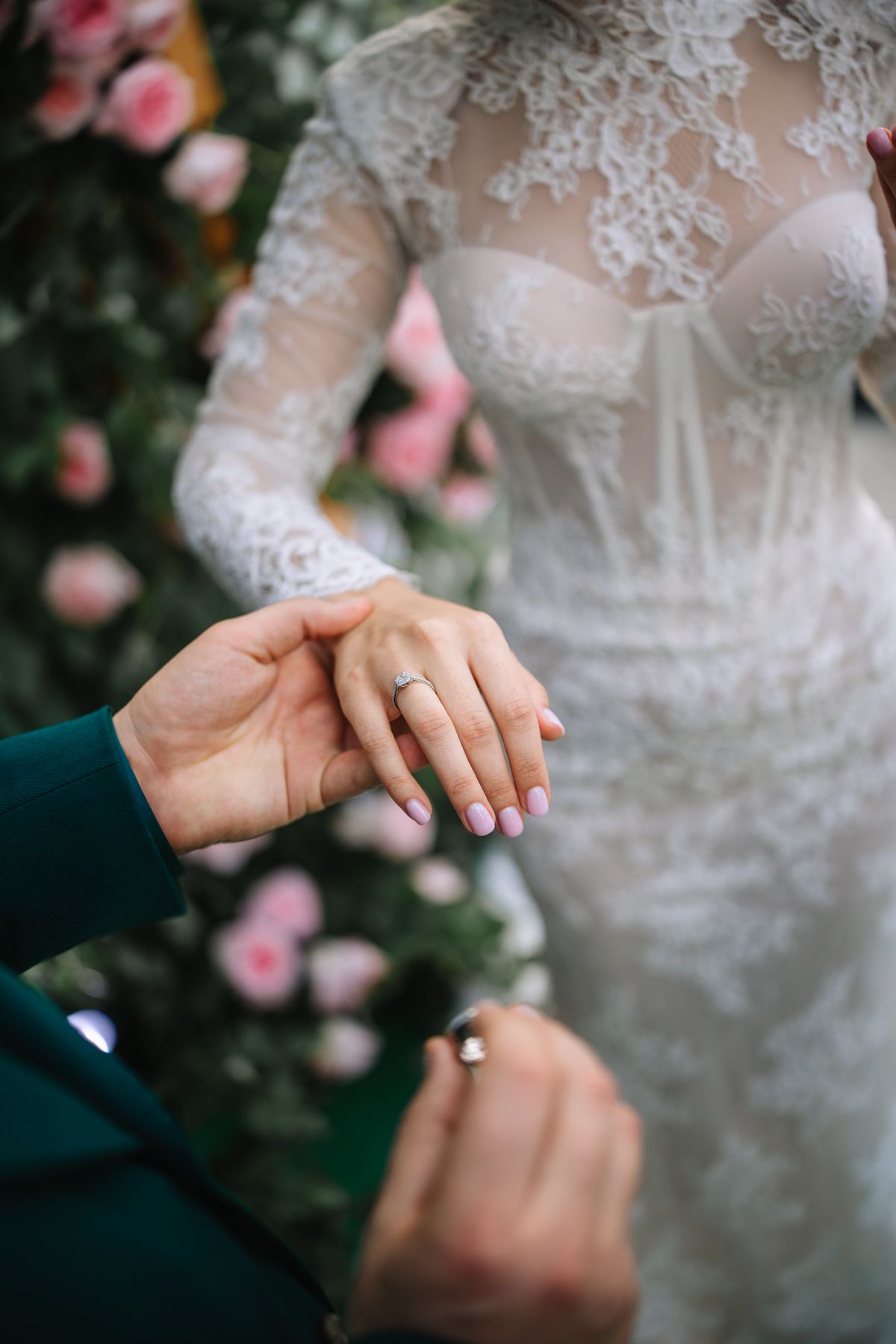 A close-up series of hands showing wedding rings and delicate lace details against a floral backdrop.