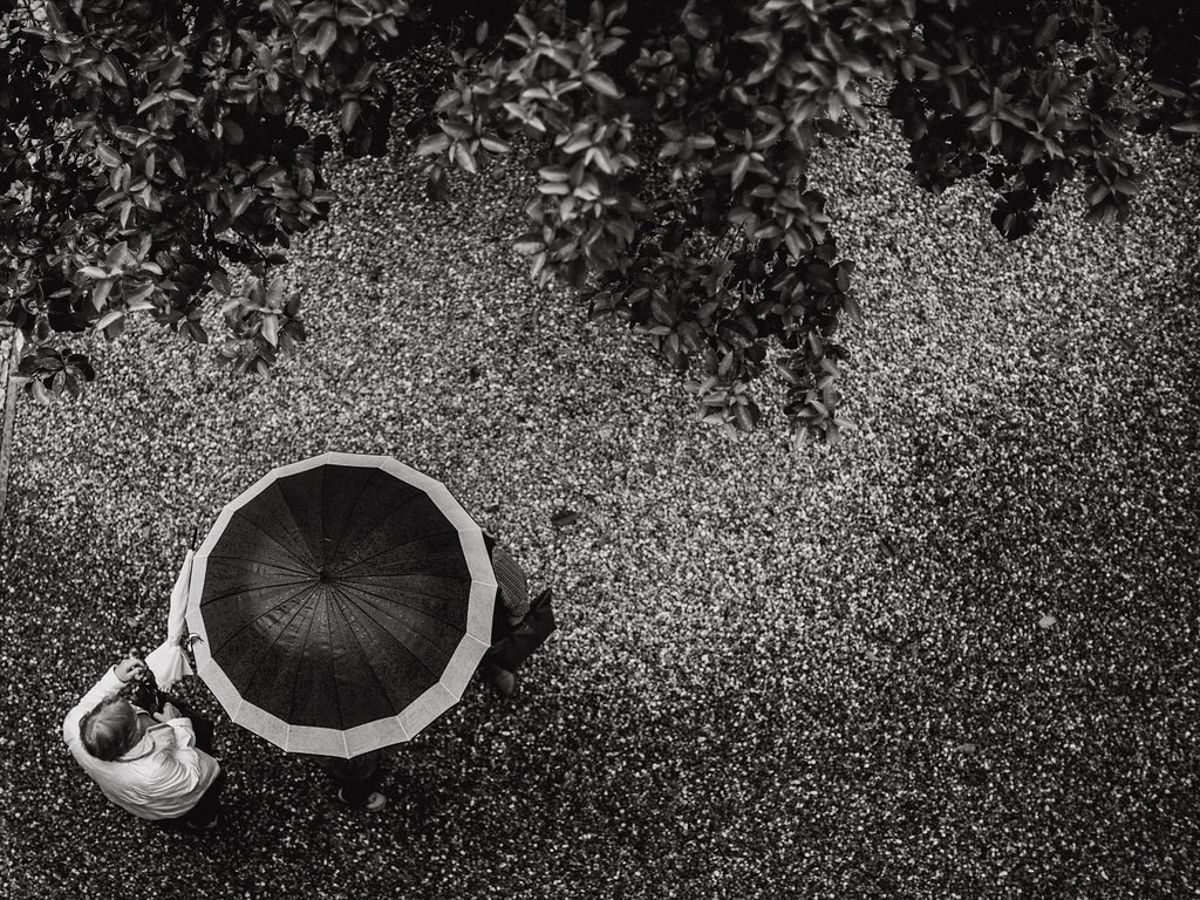 Black and white wedding details featuring decorative snowflake ornaments and delicate accessories.