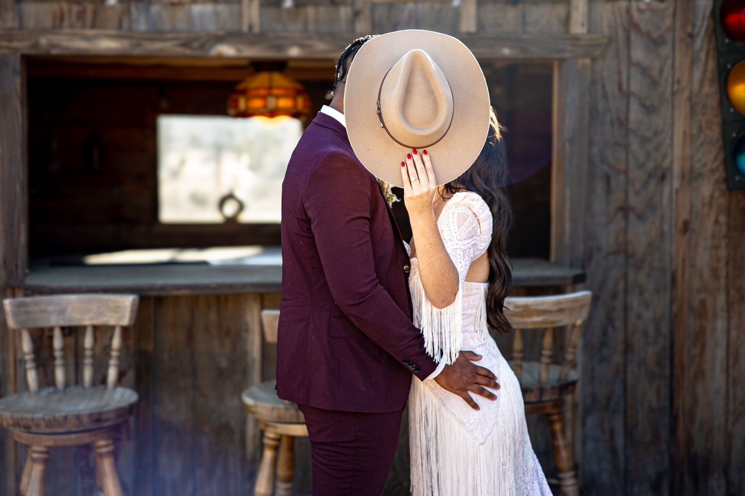 Intimate wedding moments captured in a rustic barn setting.