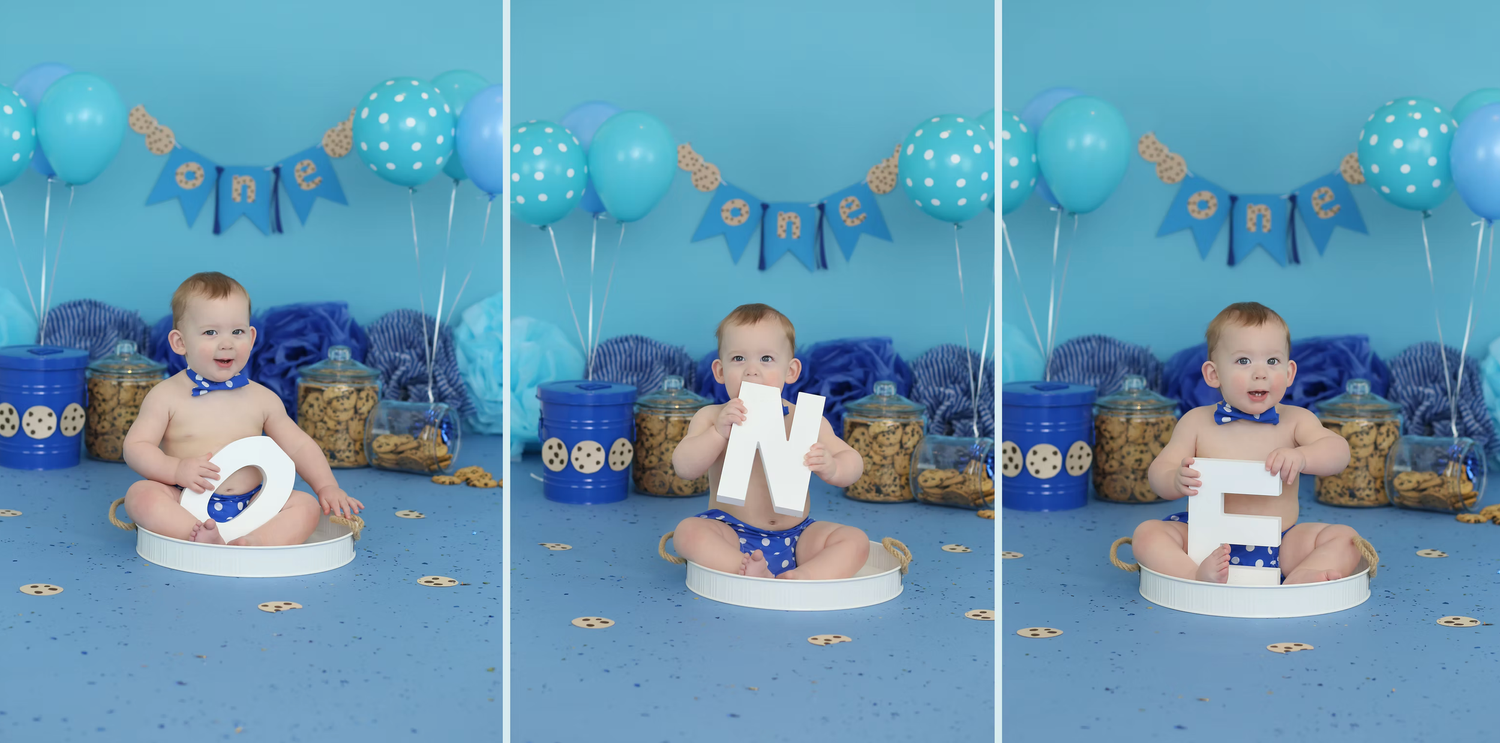 Blue winter themed birthday setup with snowflake decorations and festive banners.