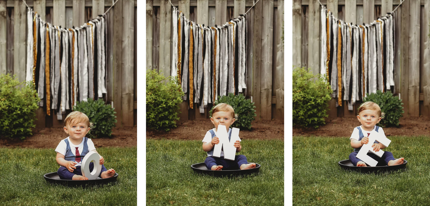Outdoor photo setup with hanging white fabric streamers against natural background.