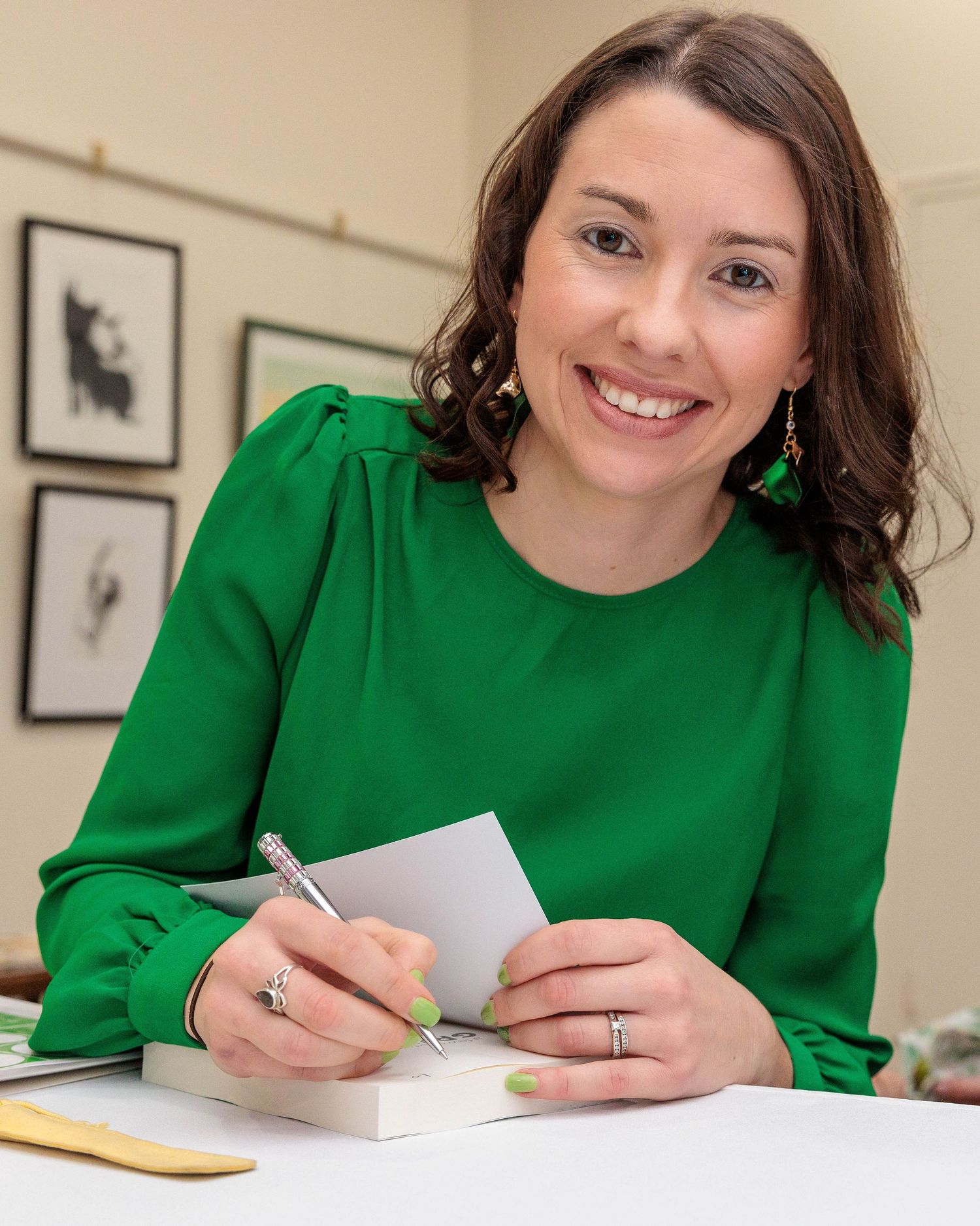 Author signing a book