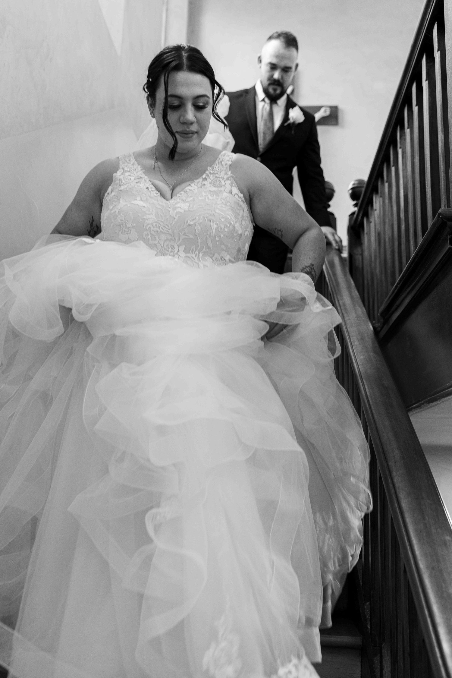 bride and groom leave the chapel at the Convent Gallery
