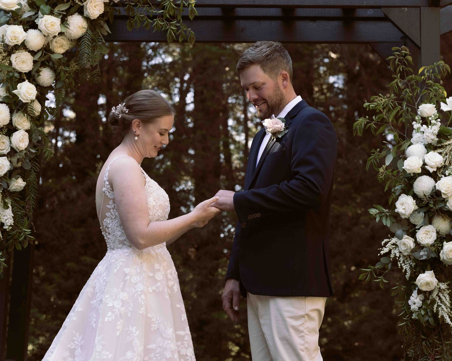 Couple exchanging wedding rings