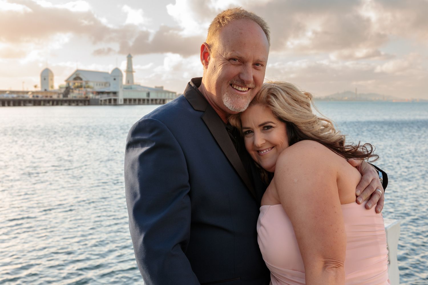 Bride and Groom on pier at Geelong Waterfront by Leigh Ball Photography