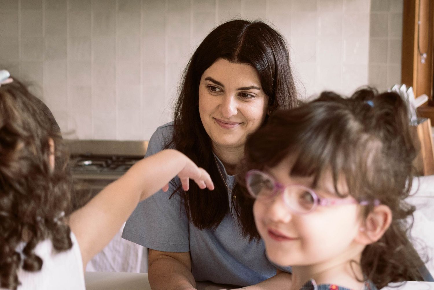 Mum and twins at kitchen bench