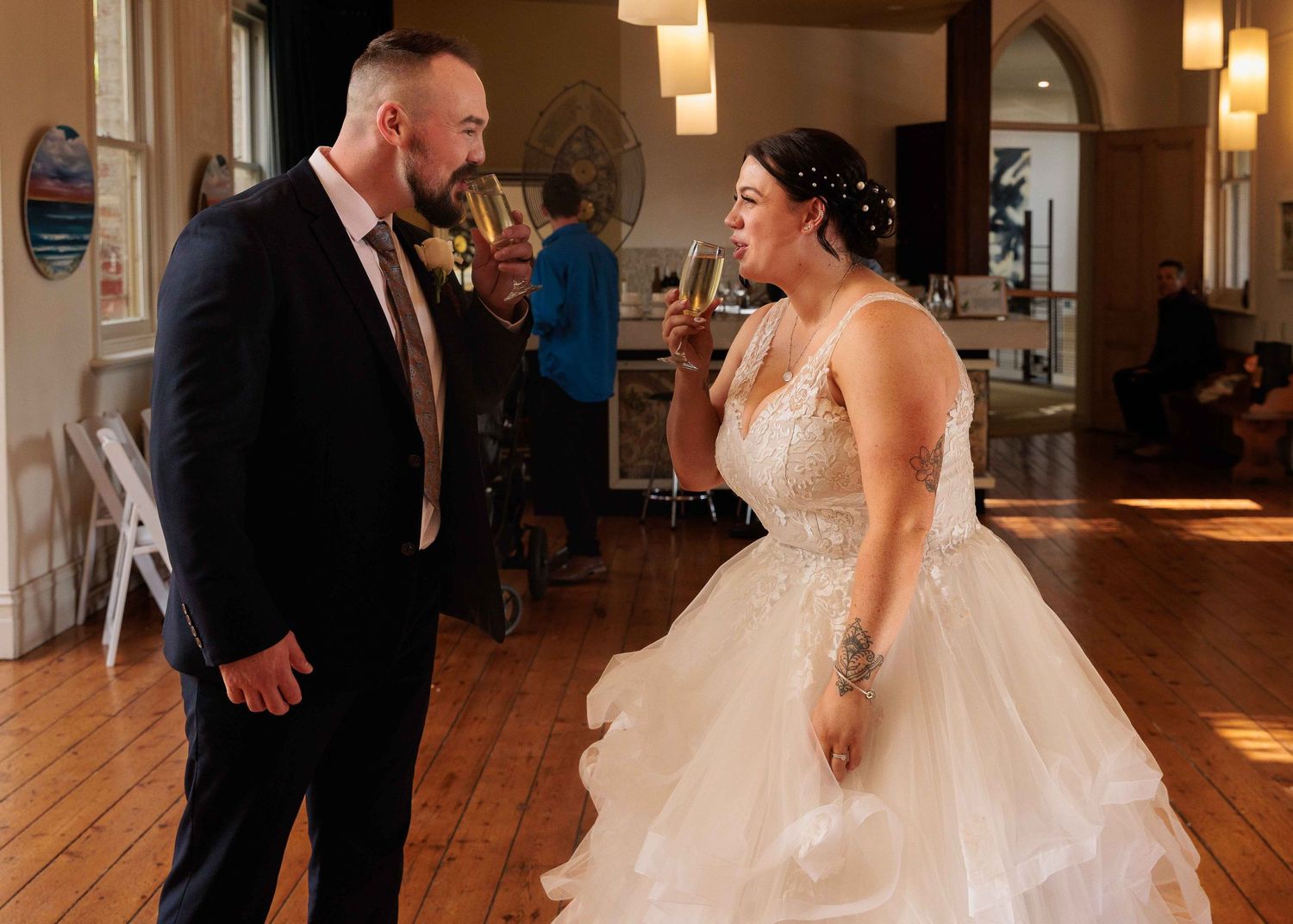 bride and groom share first toast and drink together at The Convent Gallery