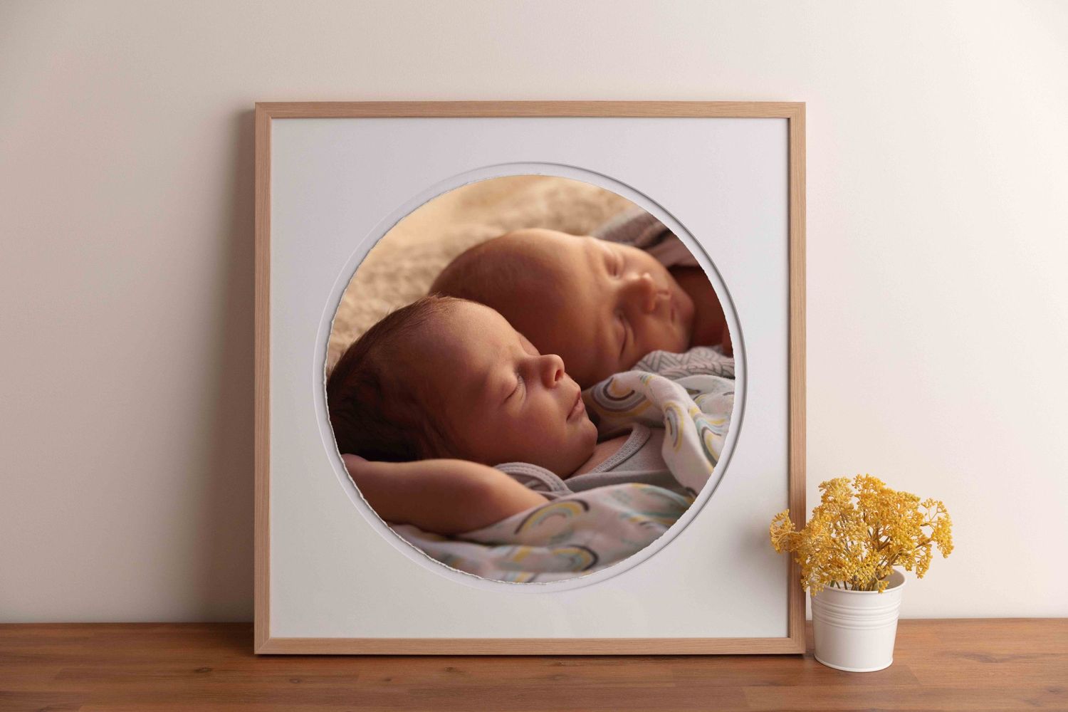 Photo of twin in an oak circular frame