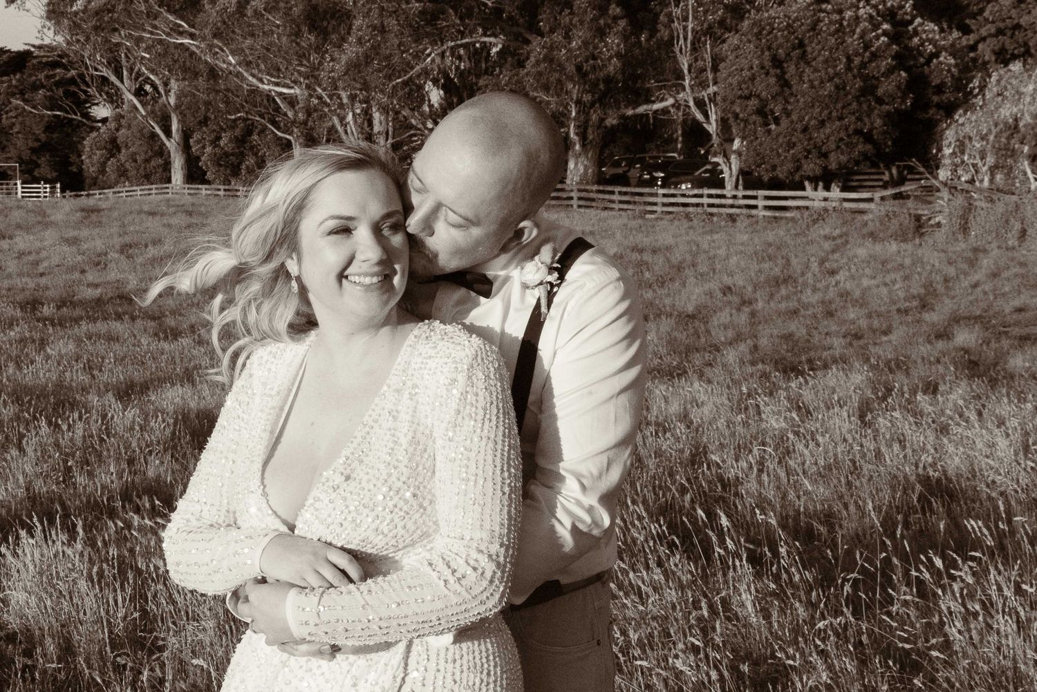 Bride and groom share a special moment in horse paddock at Quirindi stables
