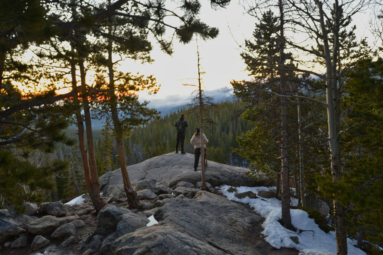 She has no clue that in a half mile from this overlook that he is gonna propose to her at Dream Lake.