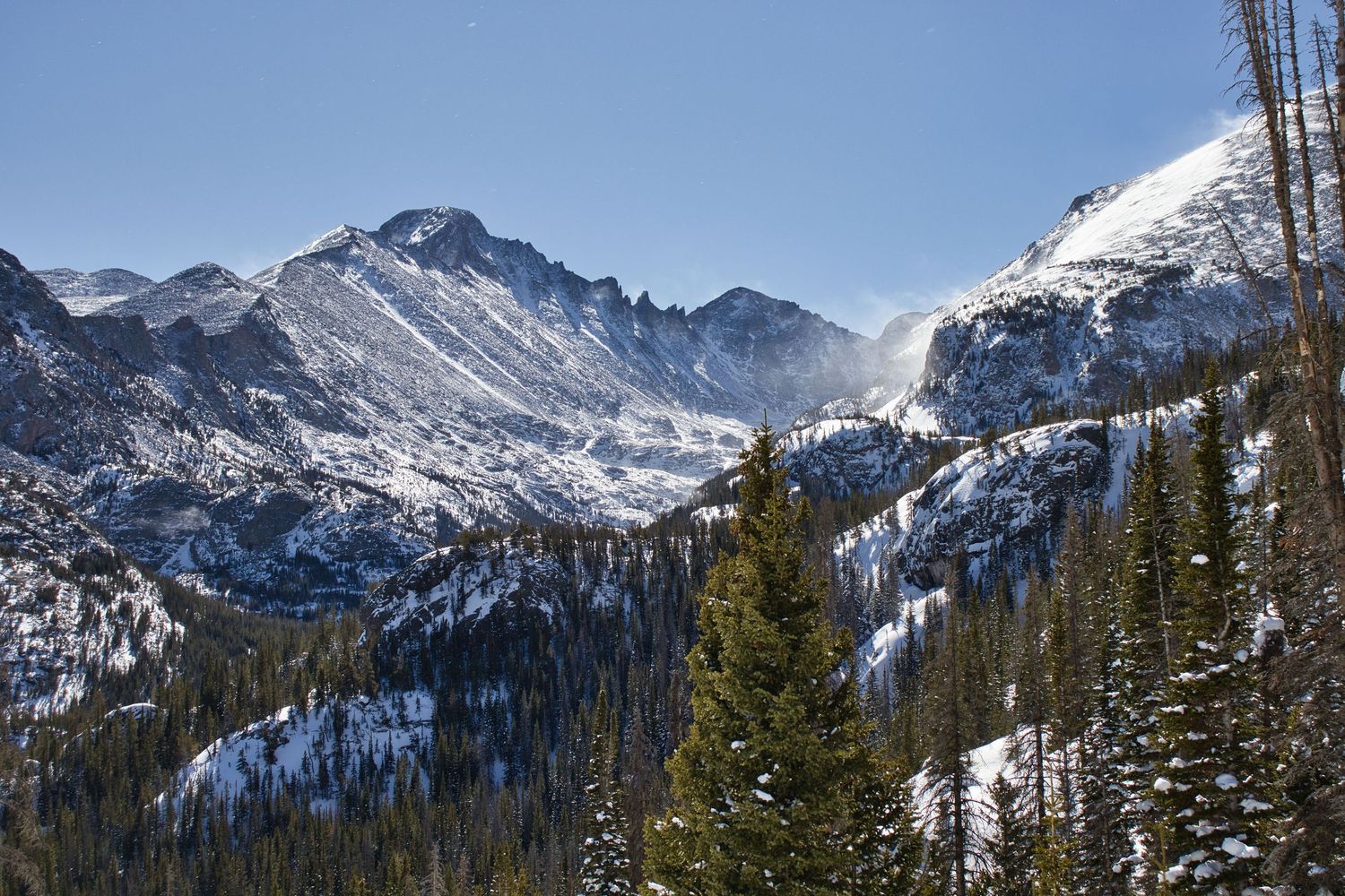 Longs Peak in the distance on a bluebird day. Rocky Mountain National Park, Taken from the Dream Lake trail.