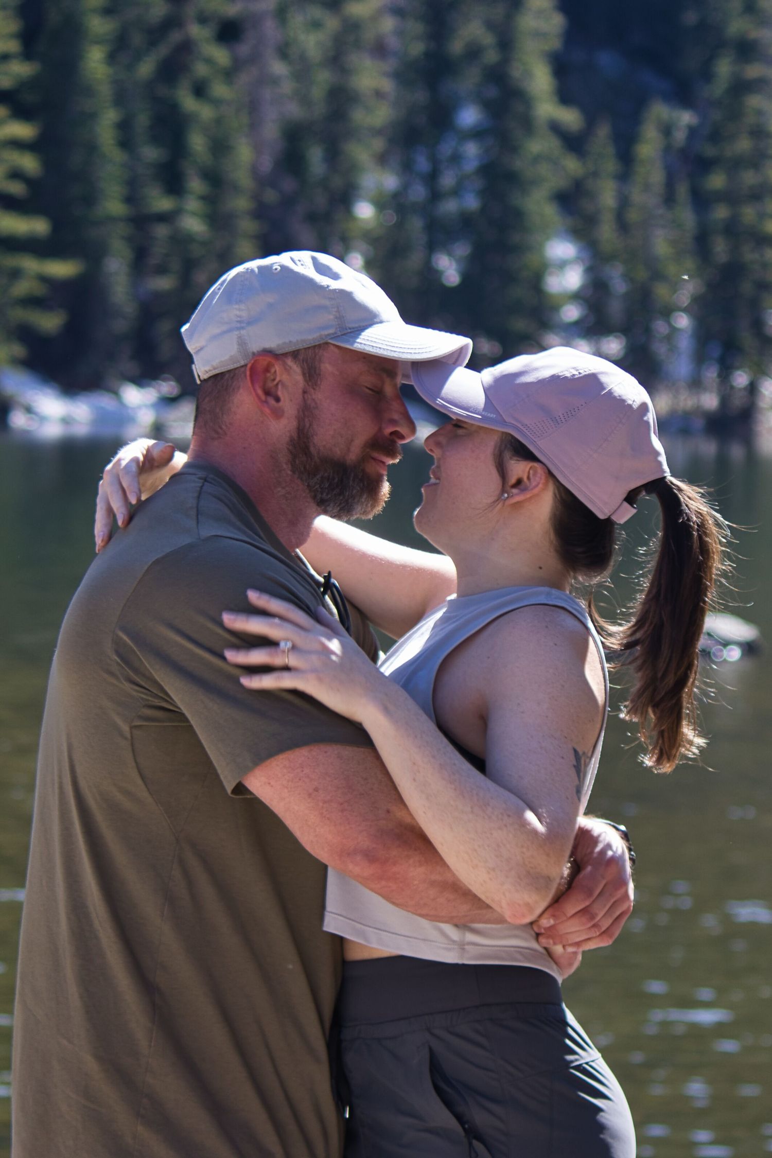 He embraces her full of love and happiness. She said yes to his proposal at Emerald Lake.