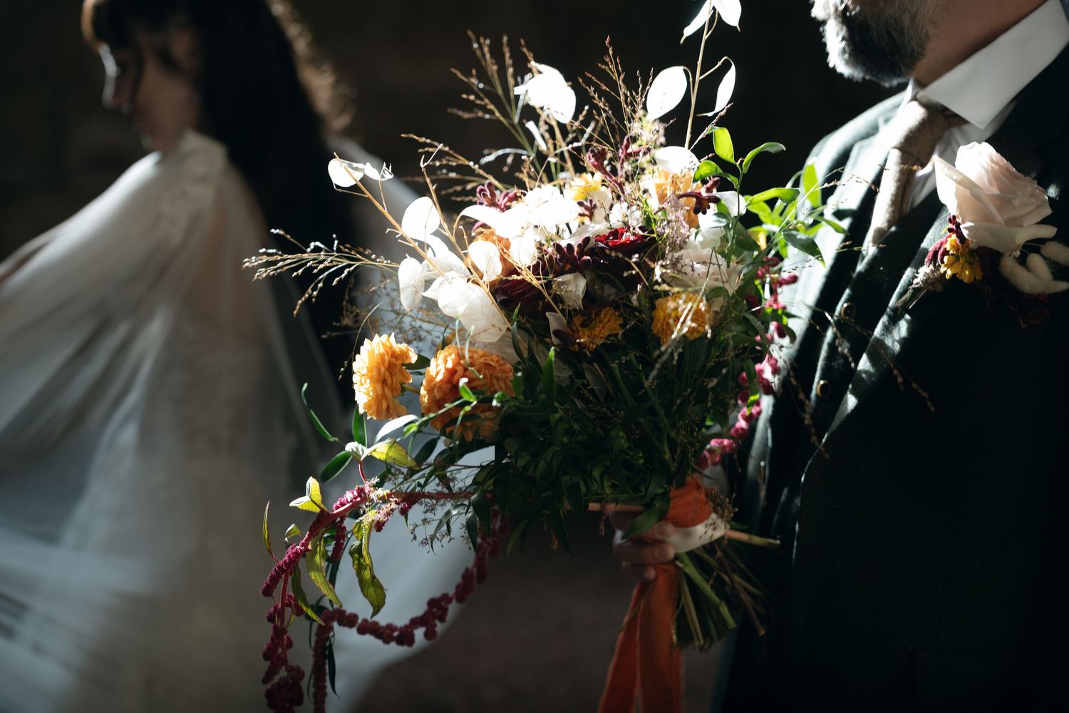 A collection of romantic wedding photos showing floral arrangements and candid moments in soft natural lighting.