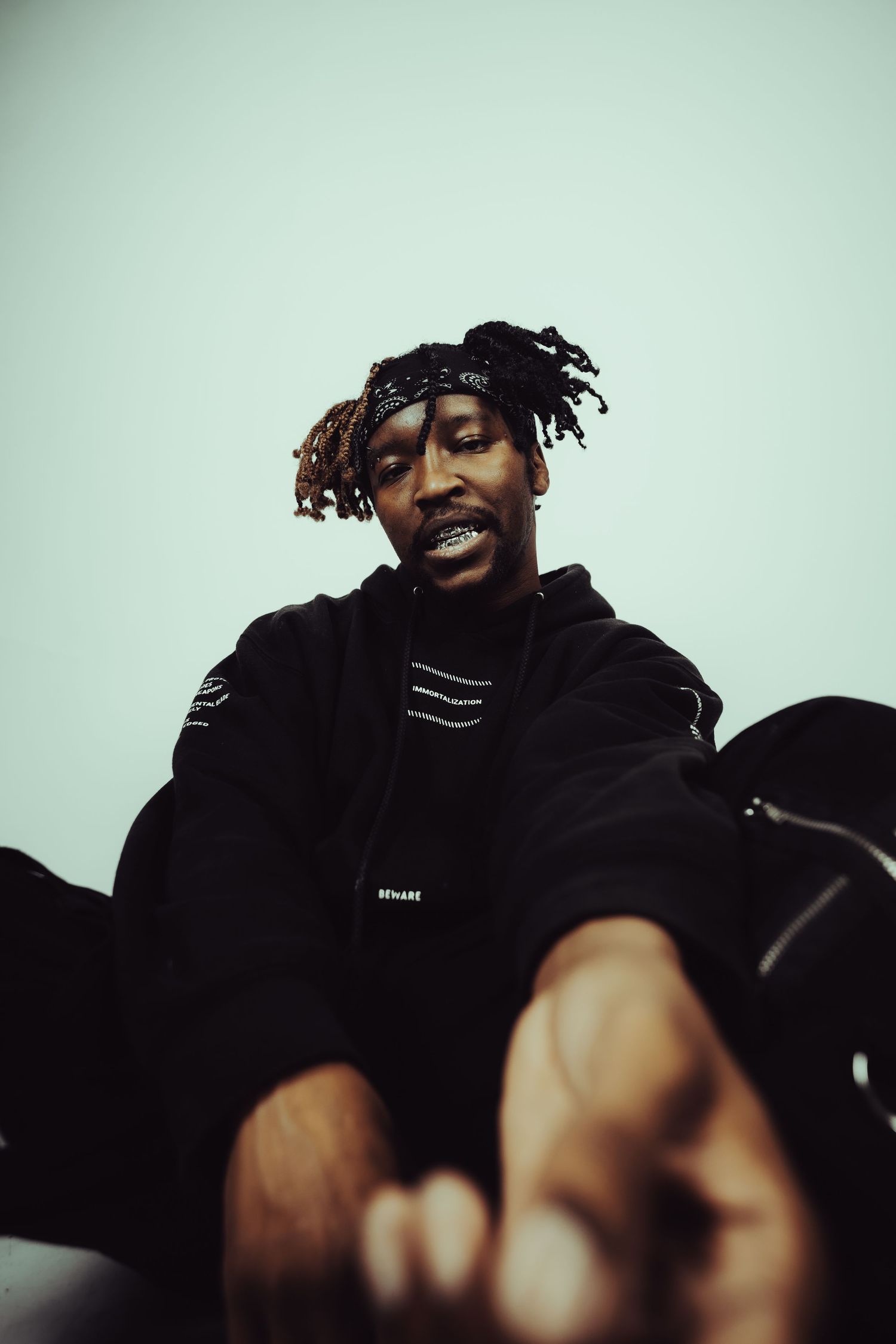 Portrait of Jang the Goon with high contrast and green backdrop