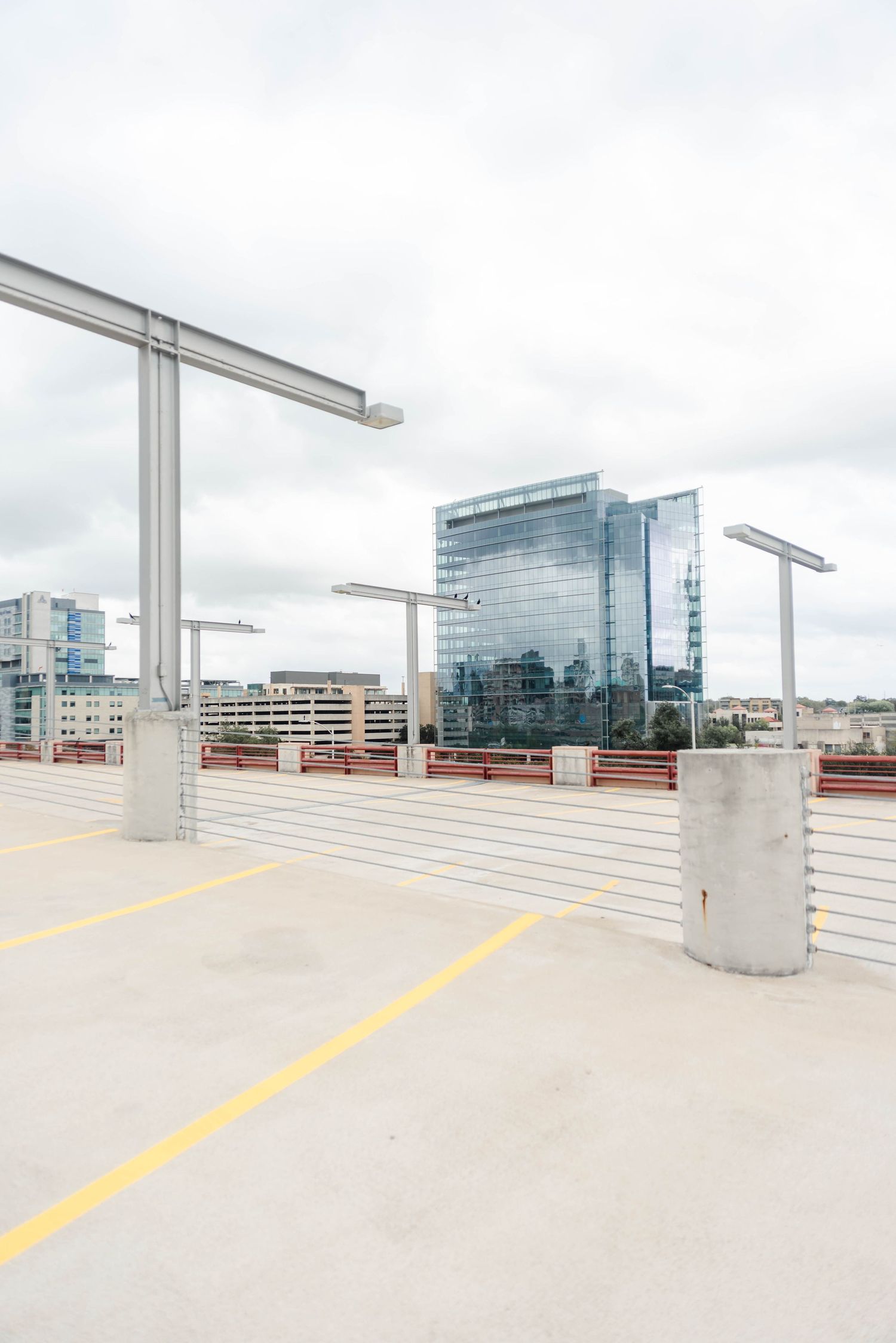 top of a parking garage with a building view