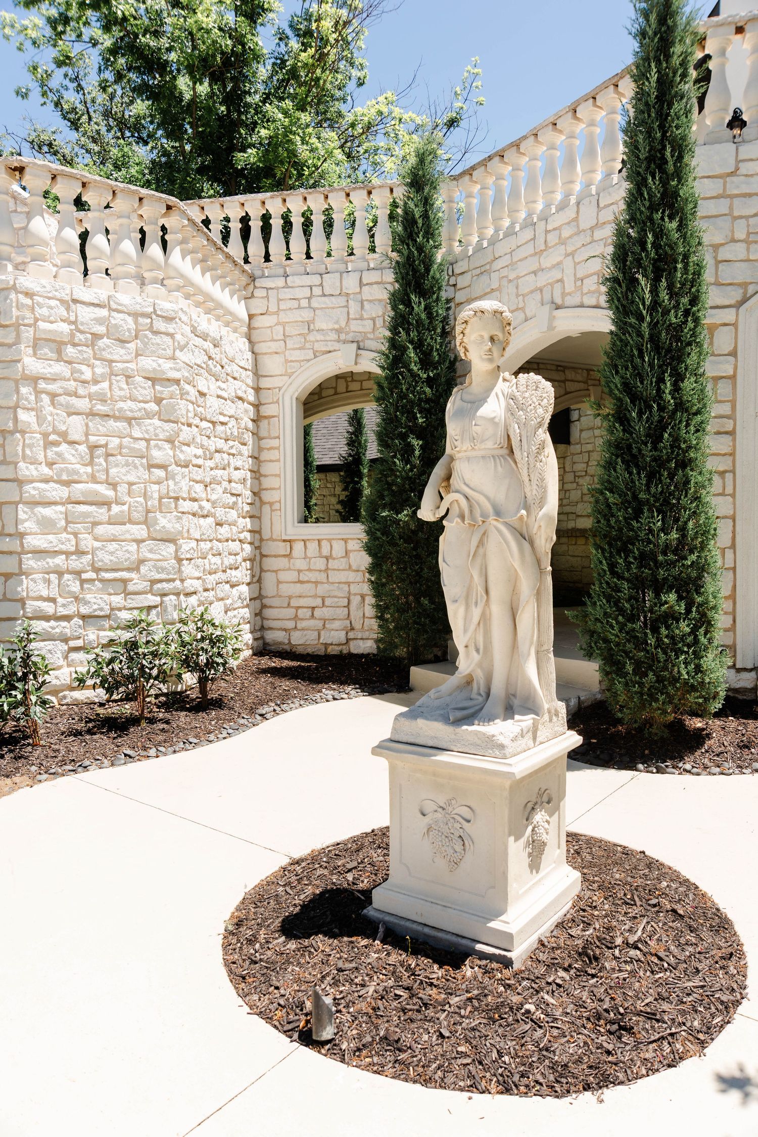 garden statue at front of venue