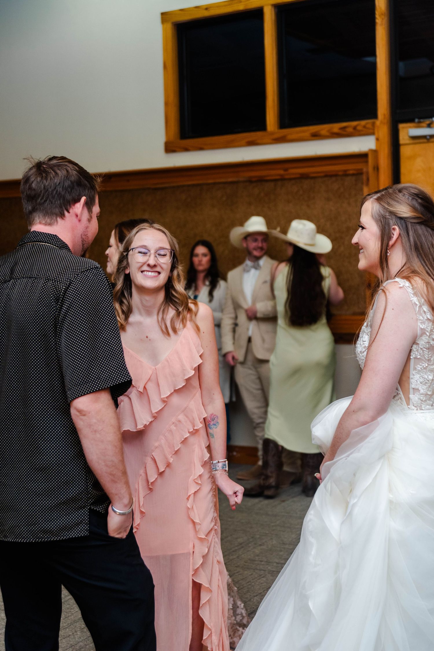 Guests talking to a bride