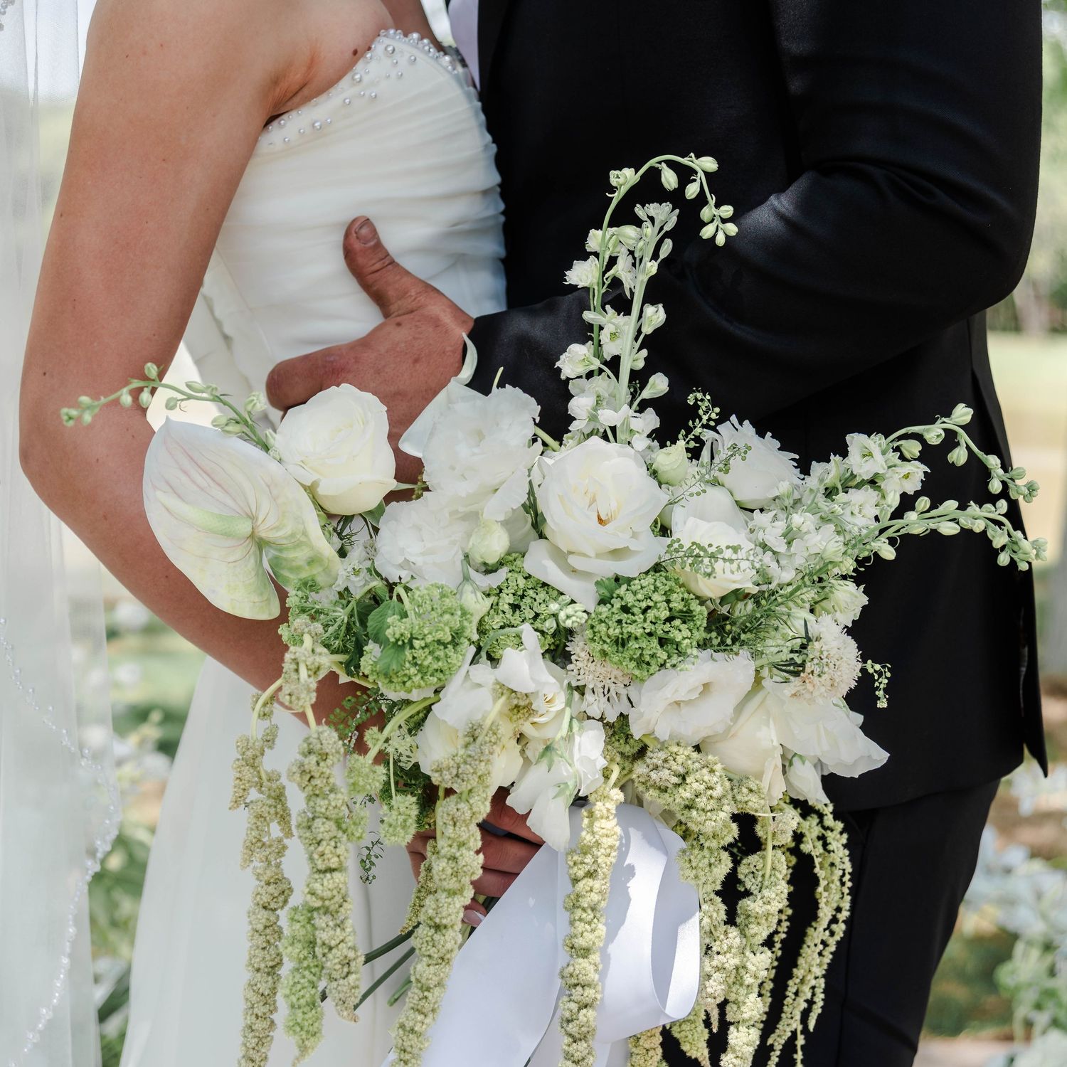 floral bouquet being held by bride