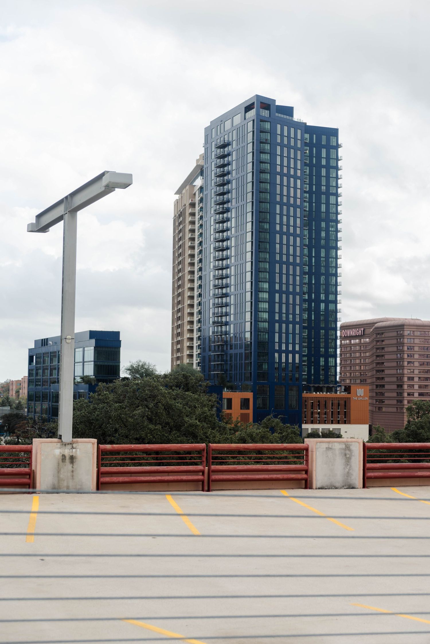 view of a building from the top of a parking garage