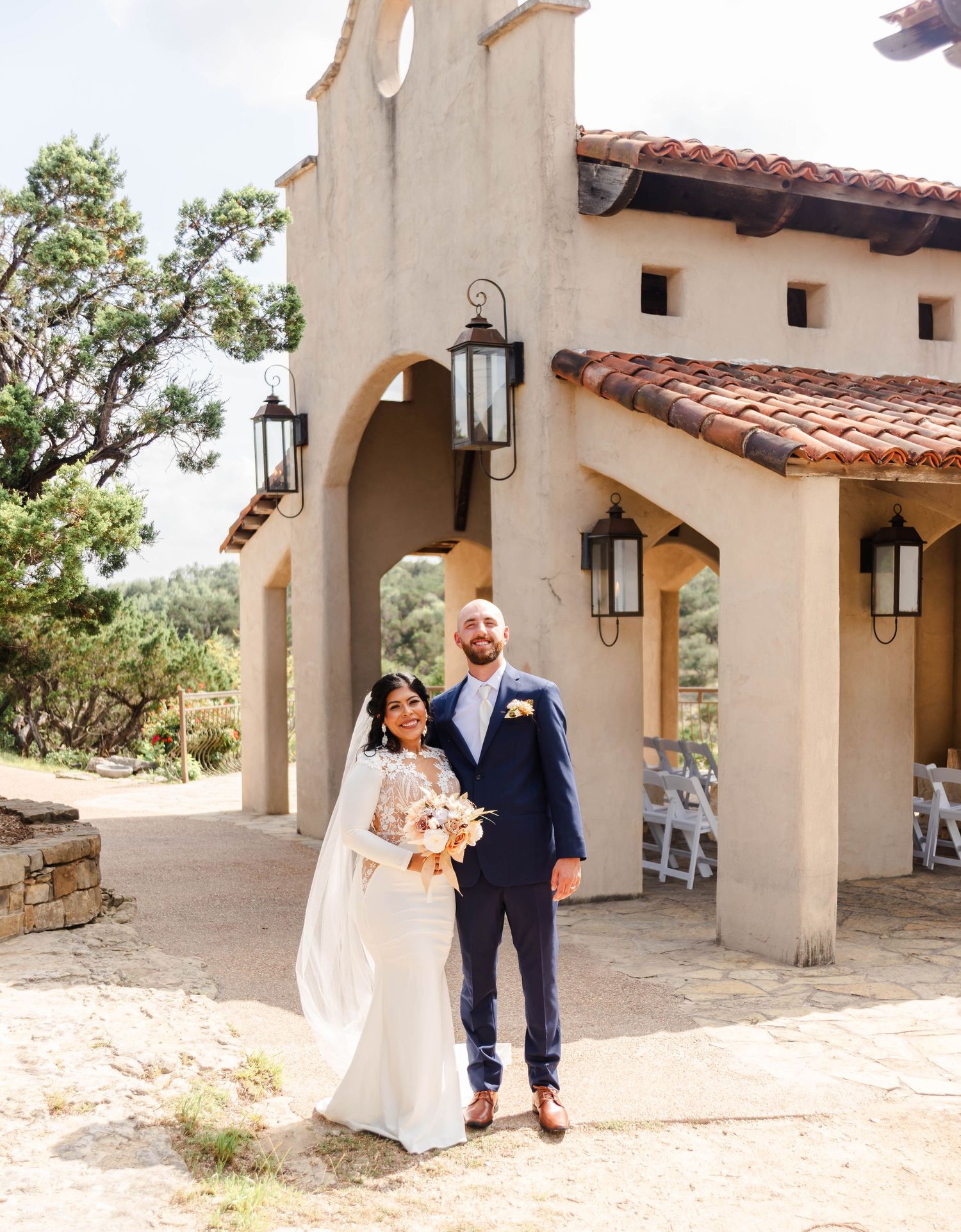 a couple poses together after their wedding
