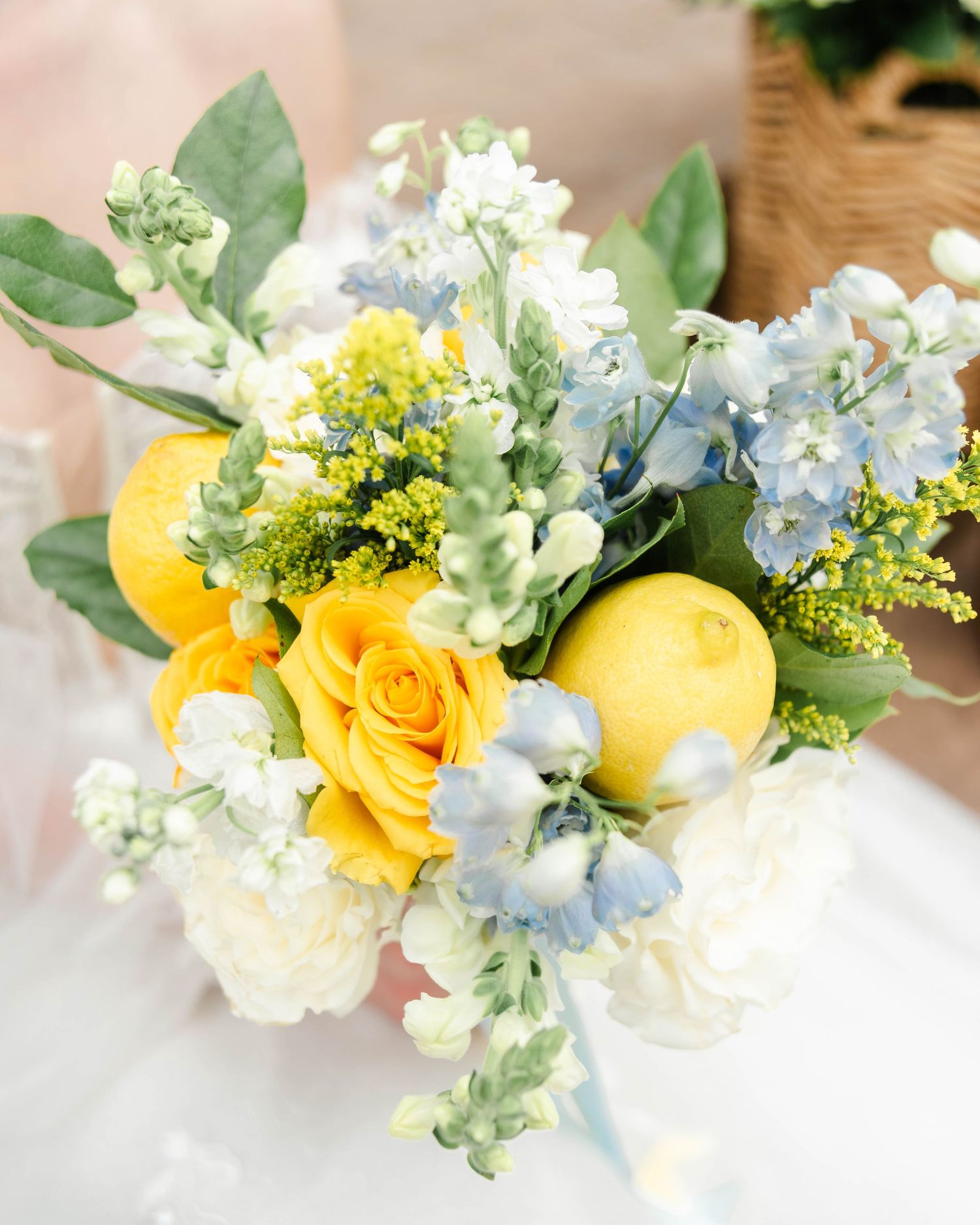 yellow bouquet featuring yellow roses and lemons