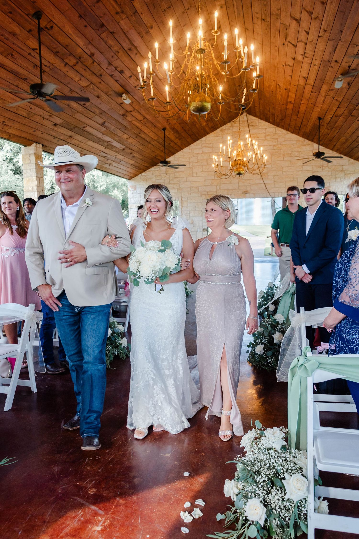 Bride walking down the aisle in China Spring Texas at Fossil Creek Wedding