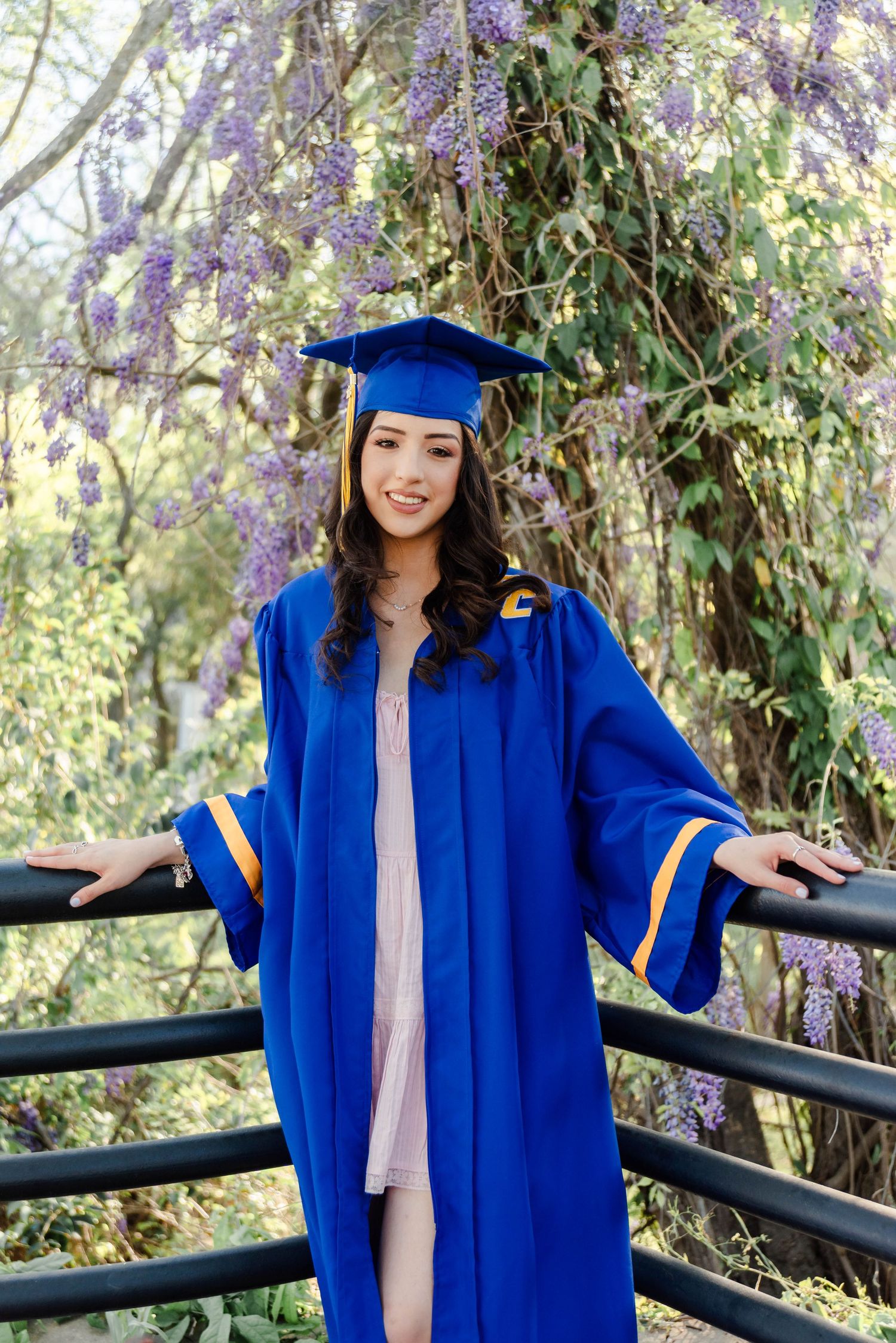 a senior in her cap and gown