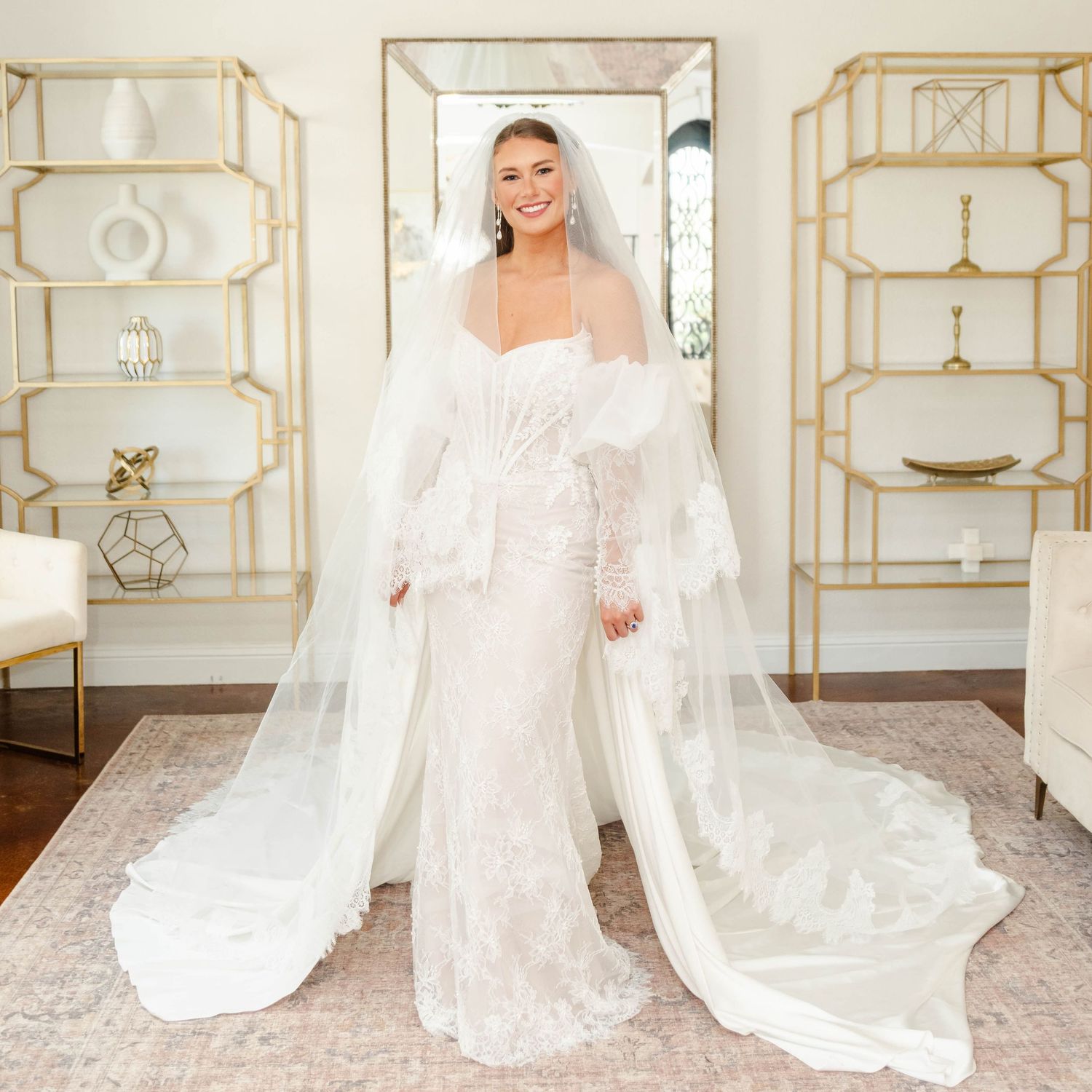 Bride smiling in front of the mirror