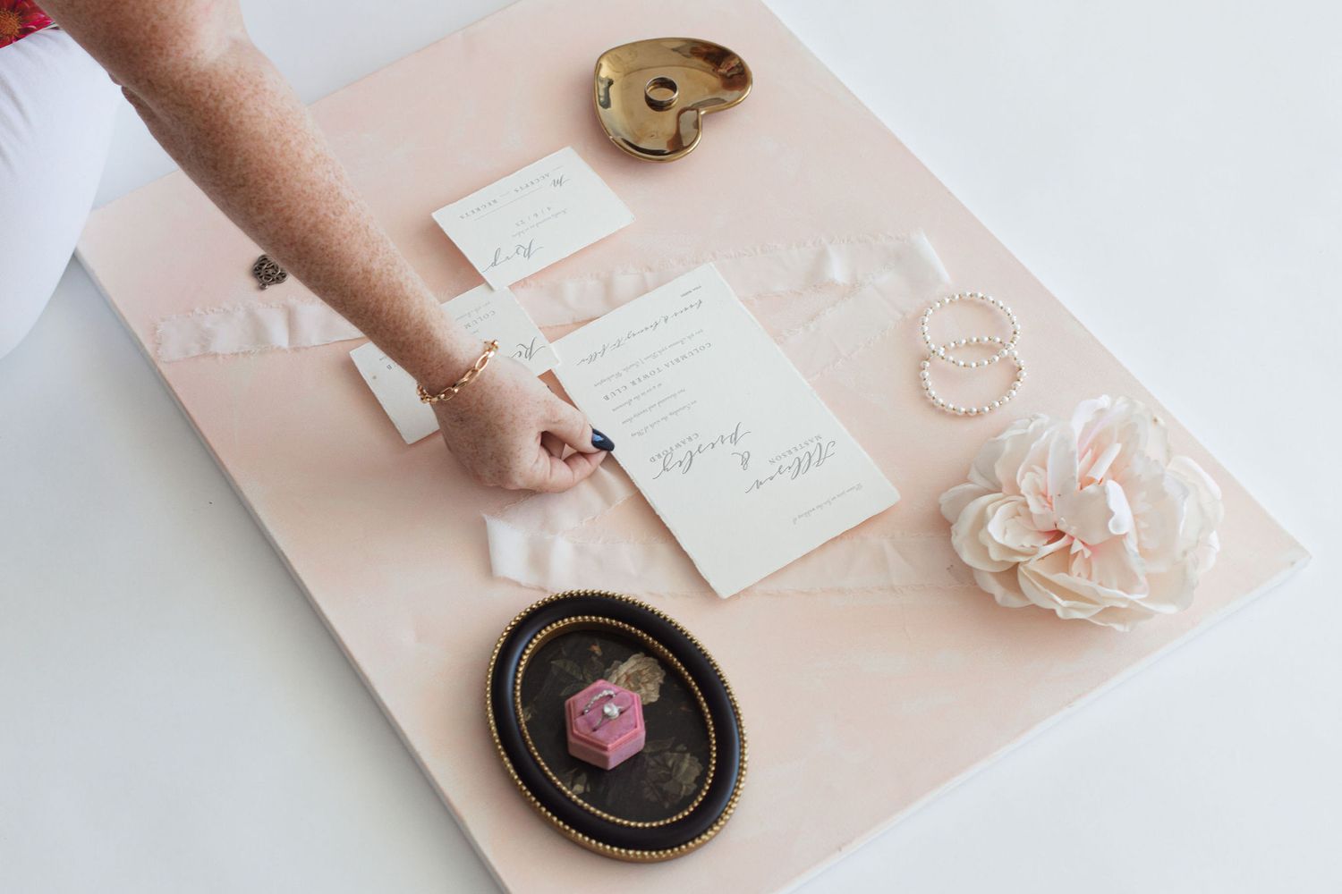 setting a lay flat for a wedding