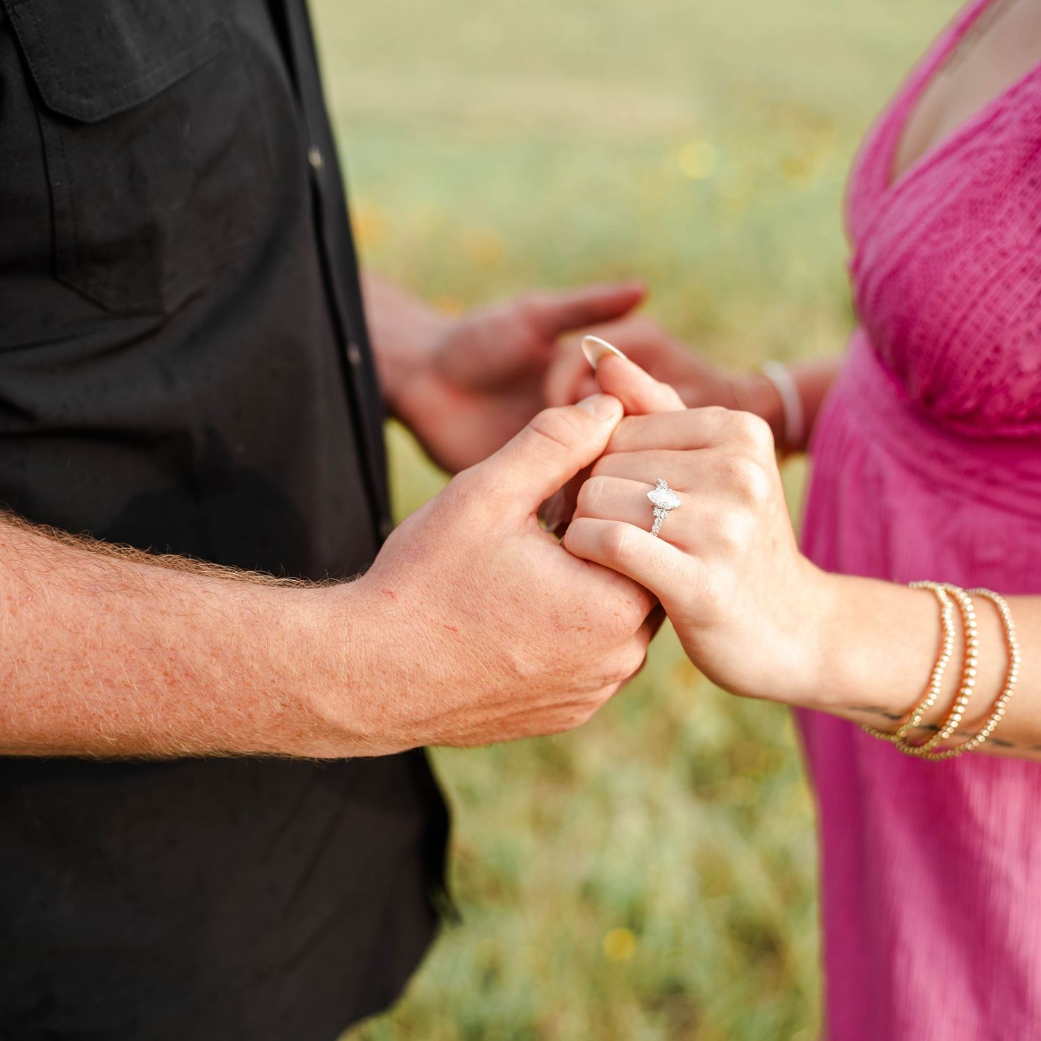 a couple holds hands
