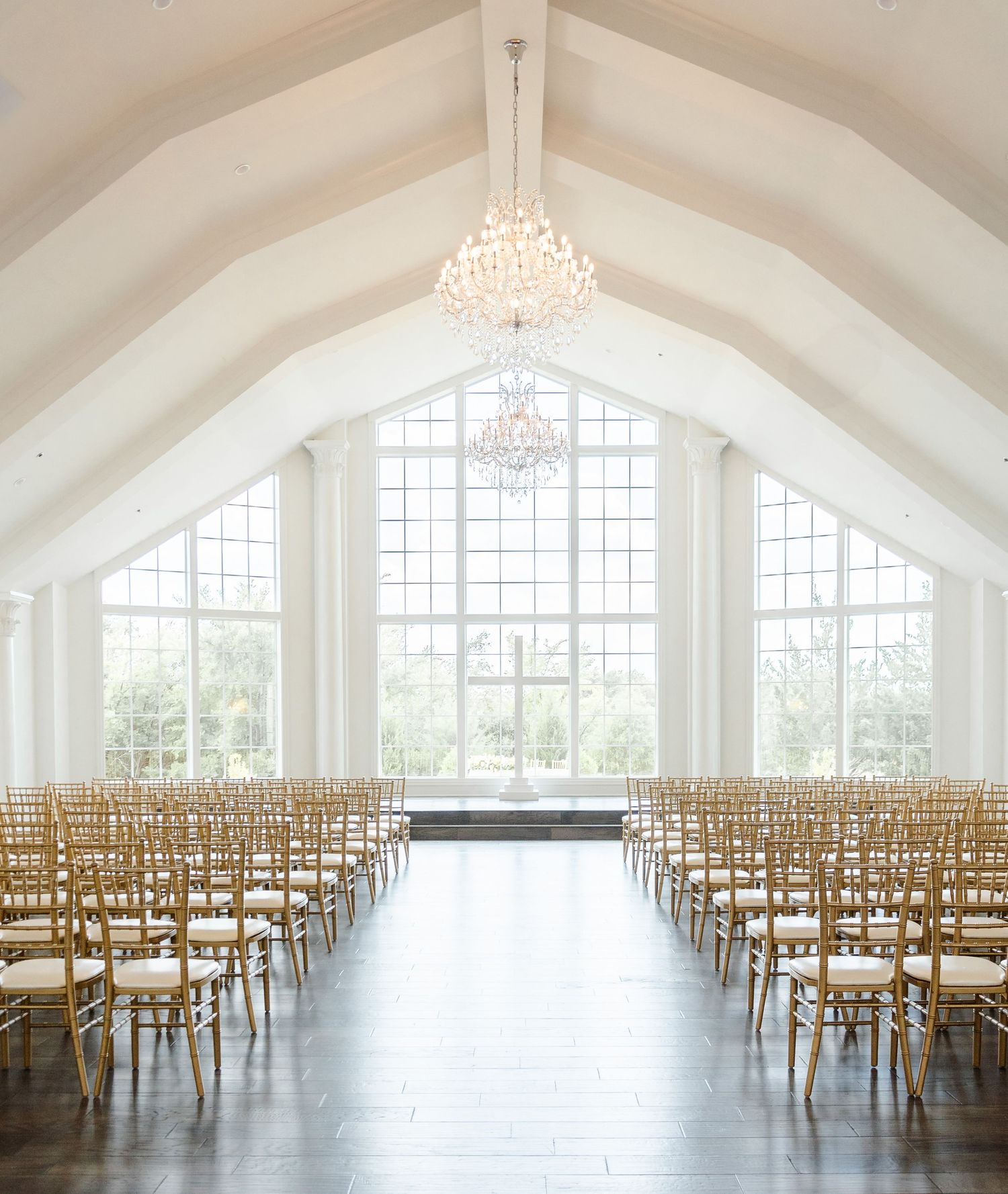 Open chapel space with large windows and natural light