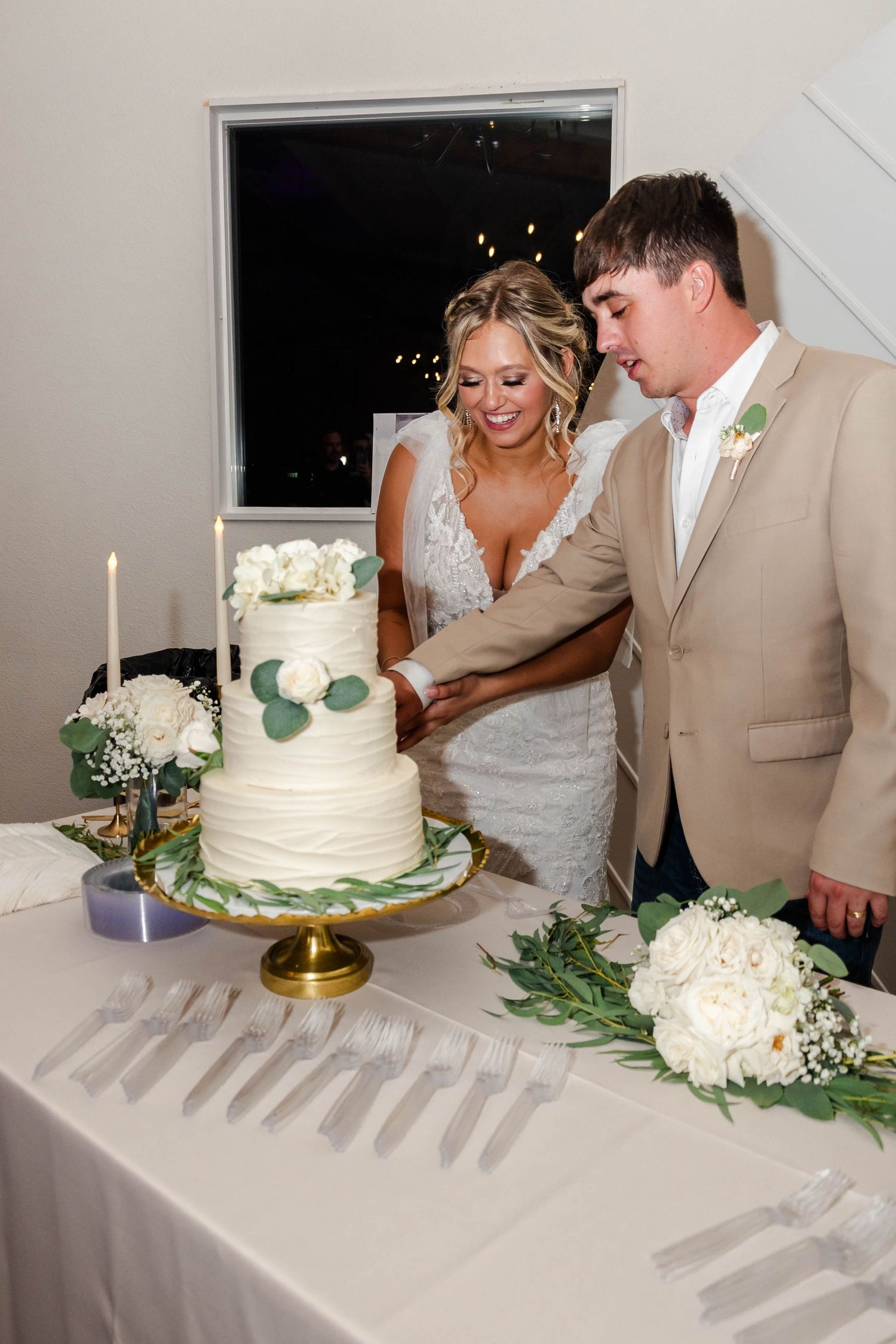 Cake cutting at Fossil Creek Wedding in China Spring Texas
