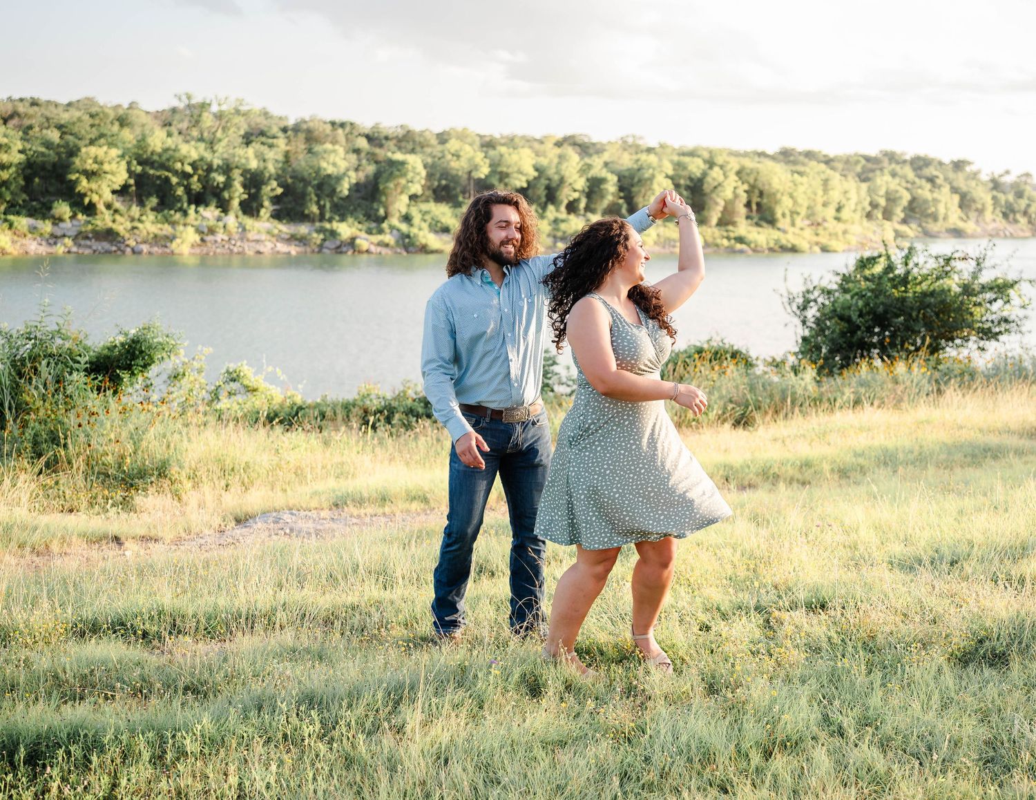a couple dances in a field
