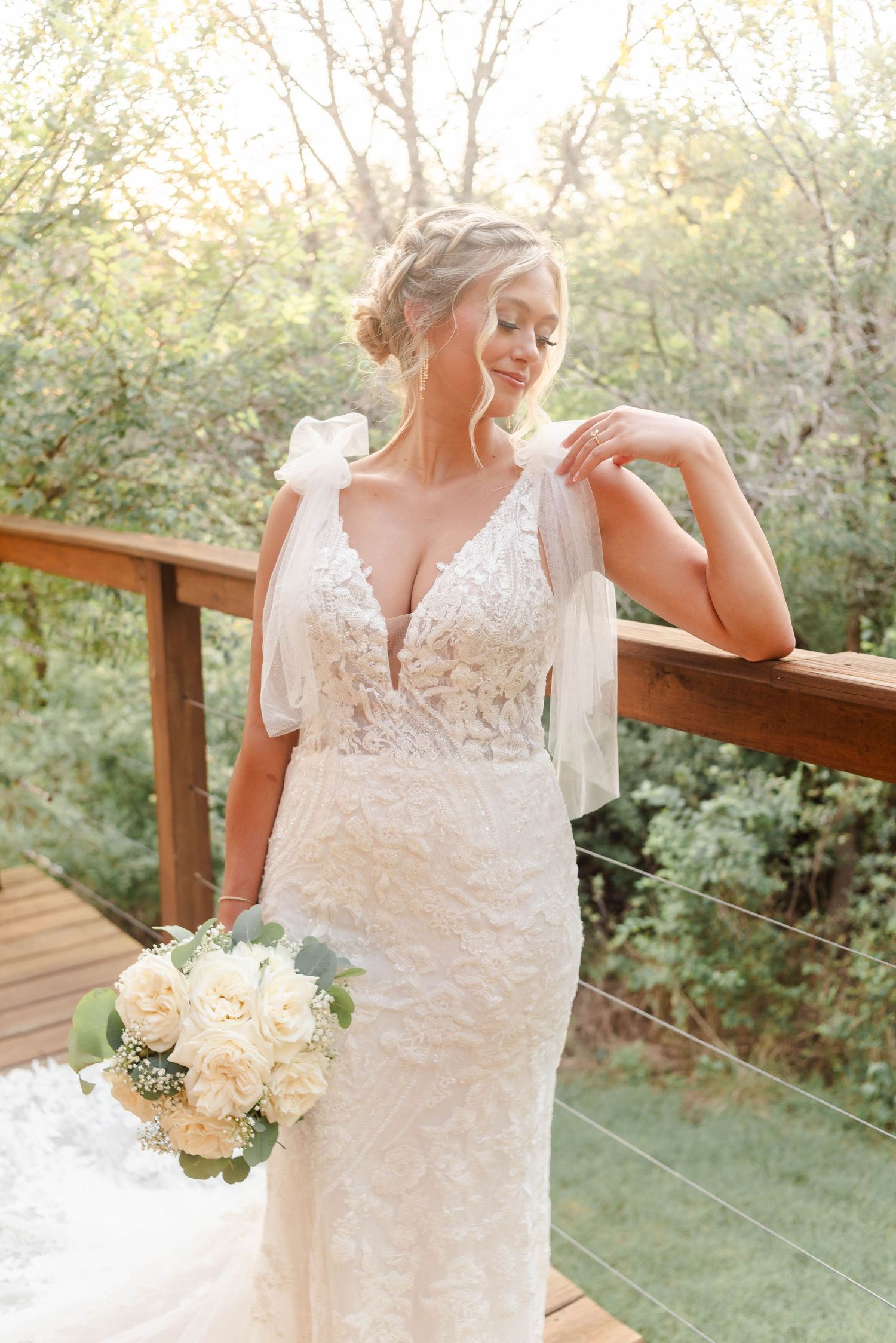 A bride looking at her engagement ring in Waco, Texas